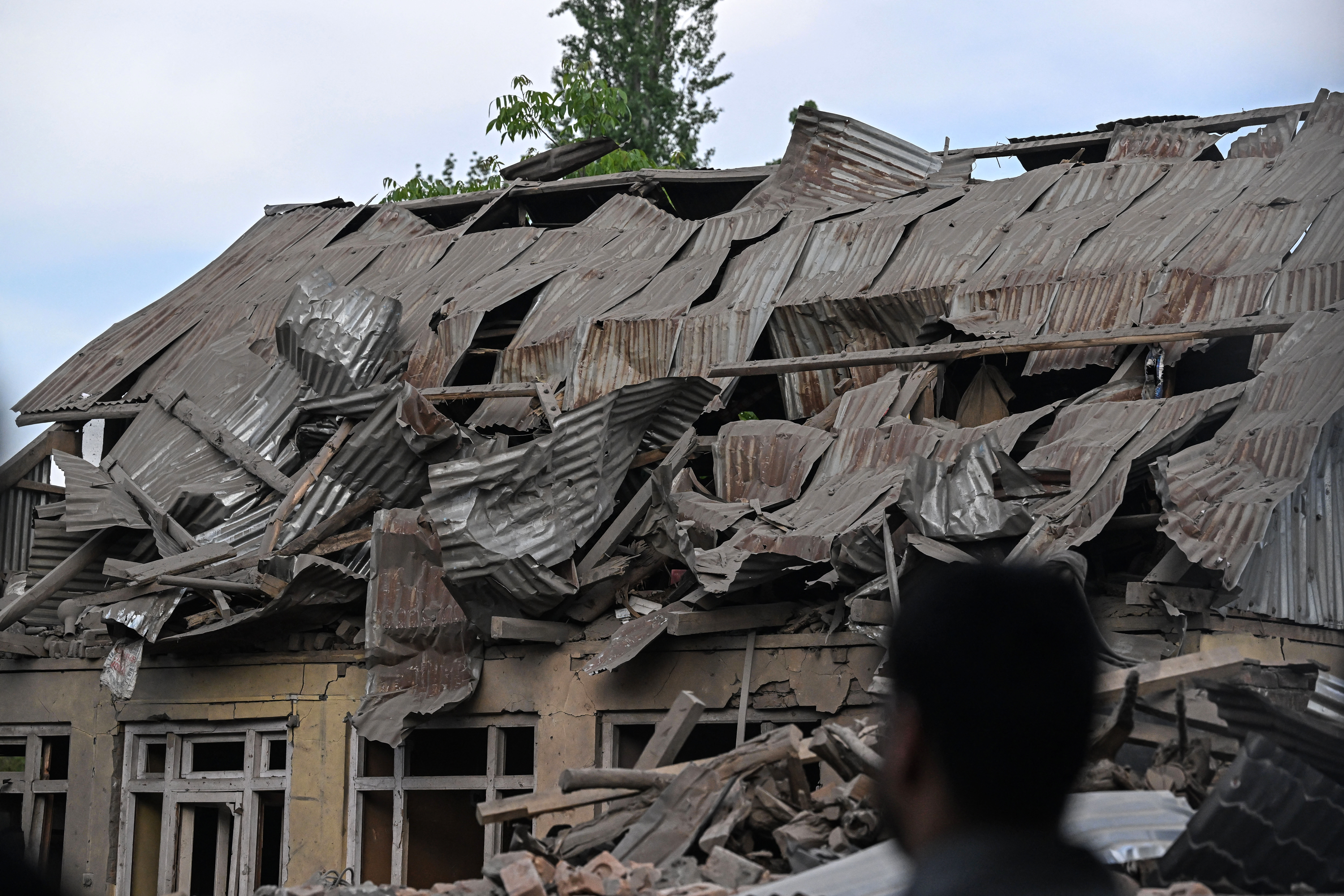 Homes destroyed in Kashmir after deadly attack sparks manhunt