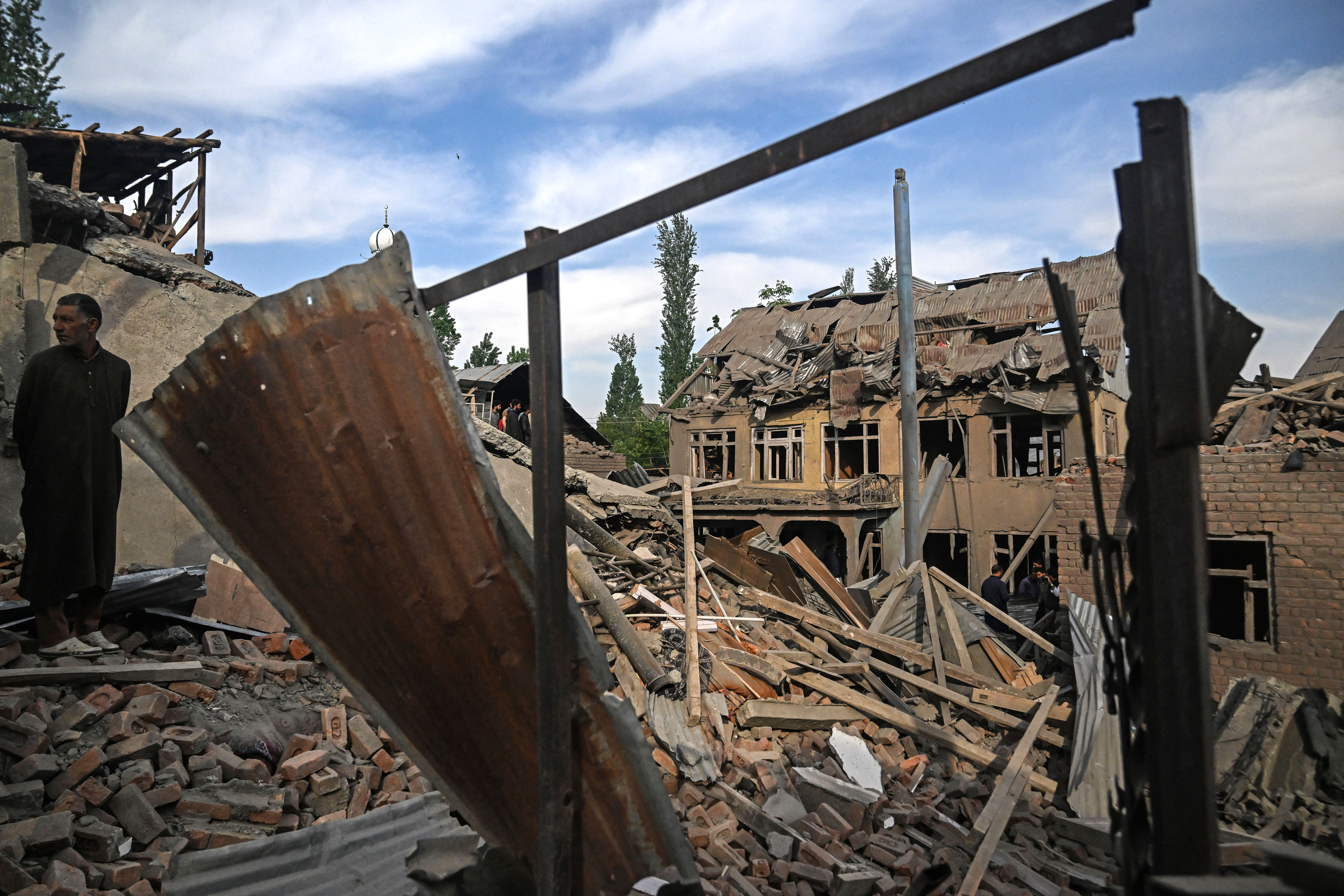Homes destroyed in Kashmir after deadly attack sparks manhunt