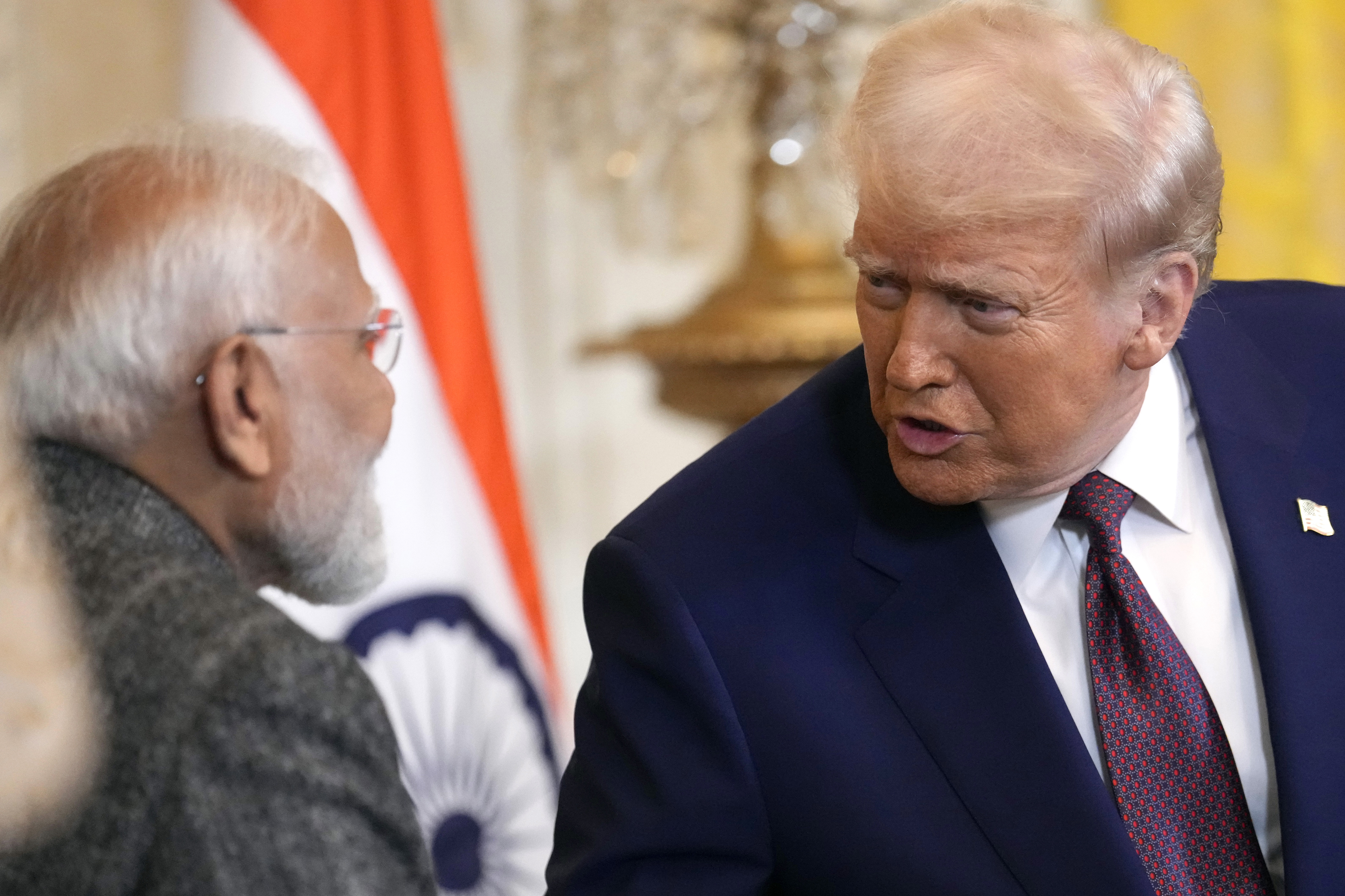 President Donald Trump, right, speaks with India's Prime Minister Narendra Modi in Washington, USA