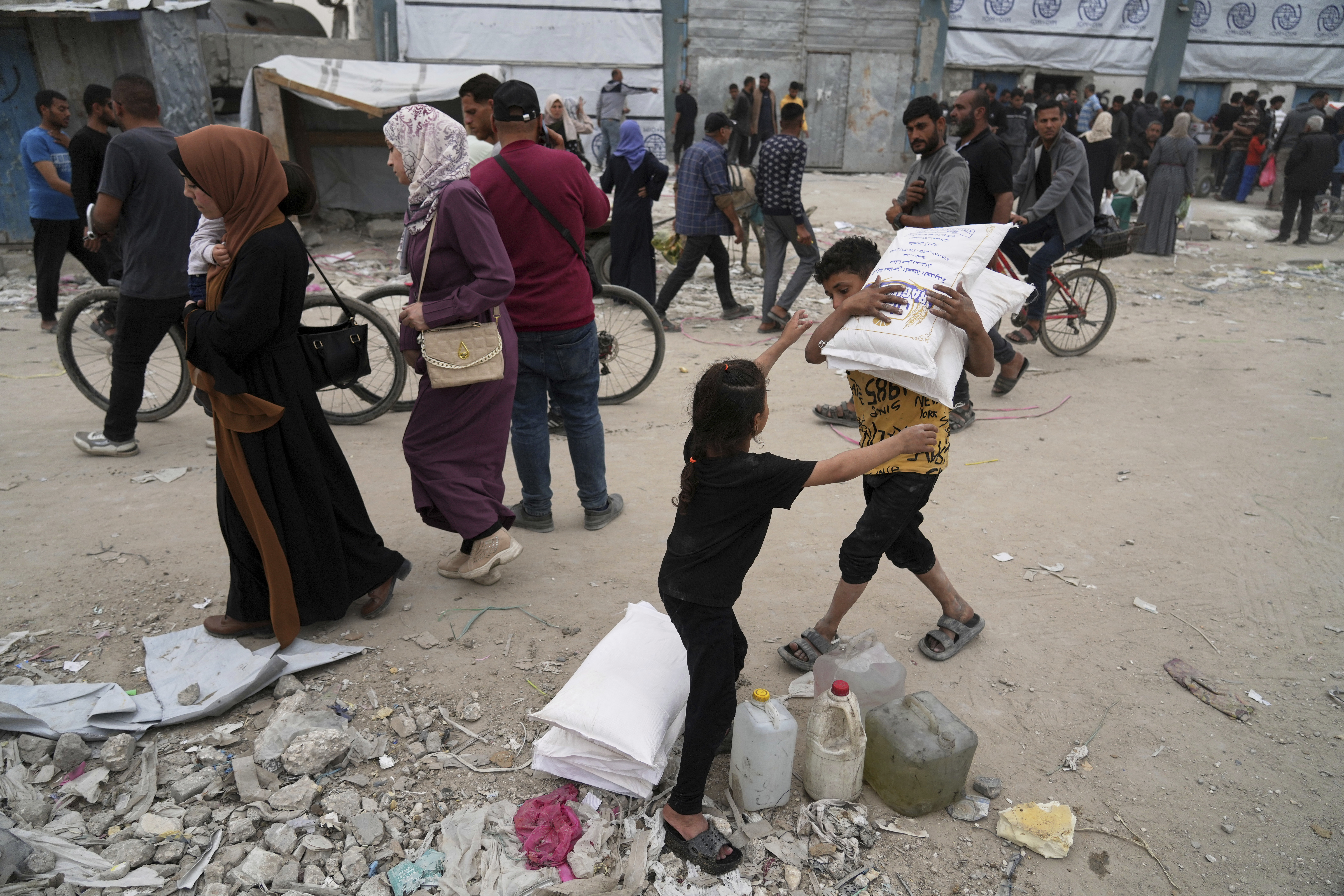 Families flee with few belongings as Gaza's shelters overflow, leaving many without tents or essential supplies.