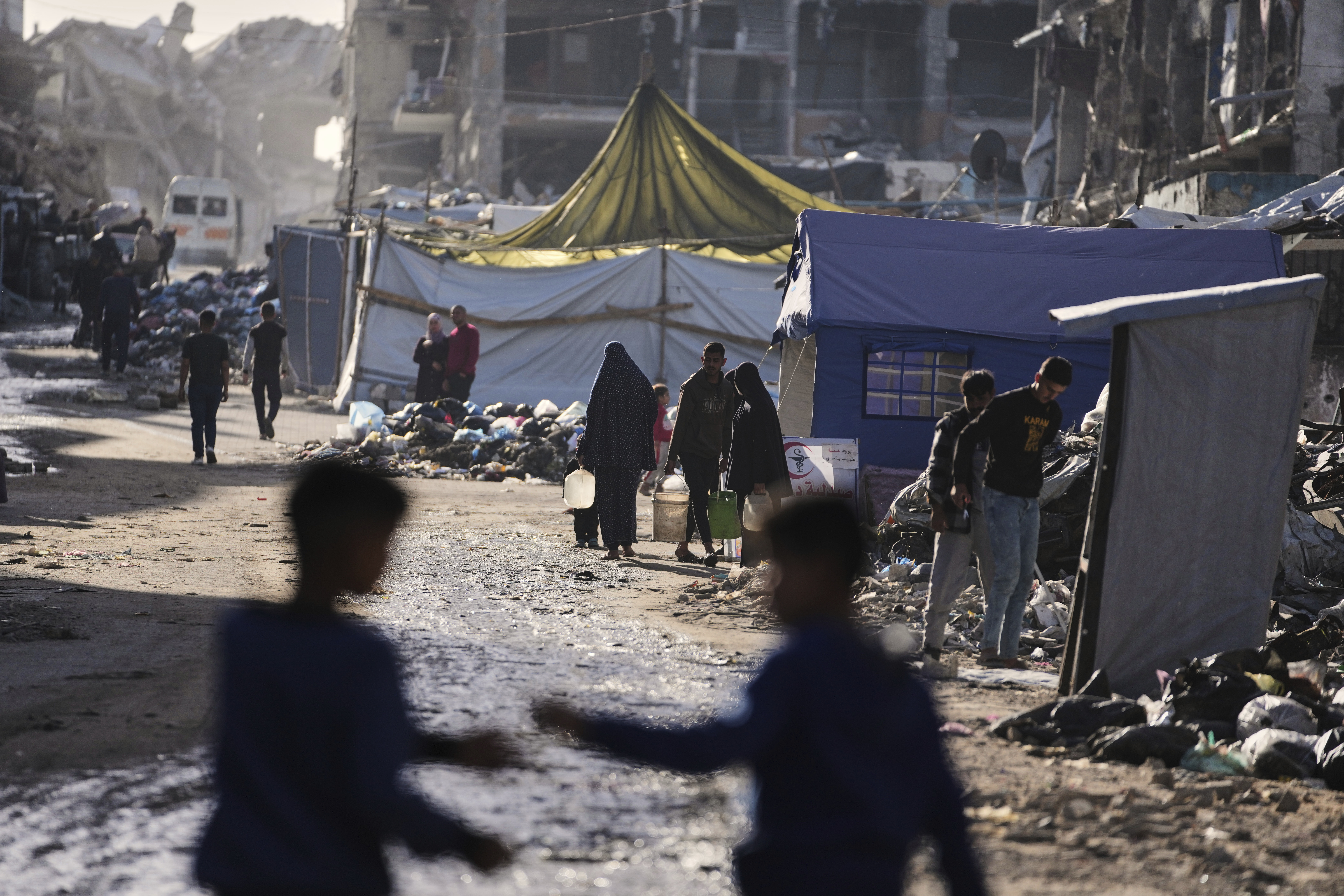 Families flee with few belongings as Gaza's shelters overflow, leaving many without tents or essential supplies.