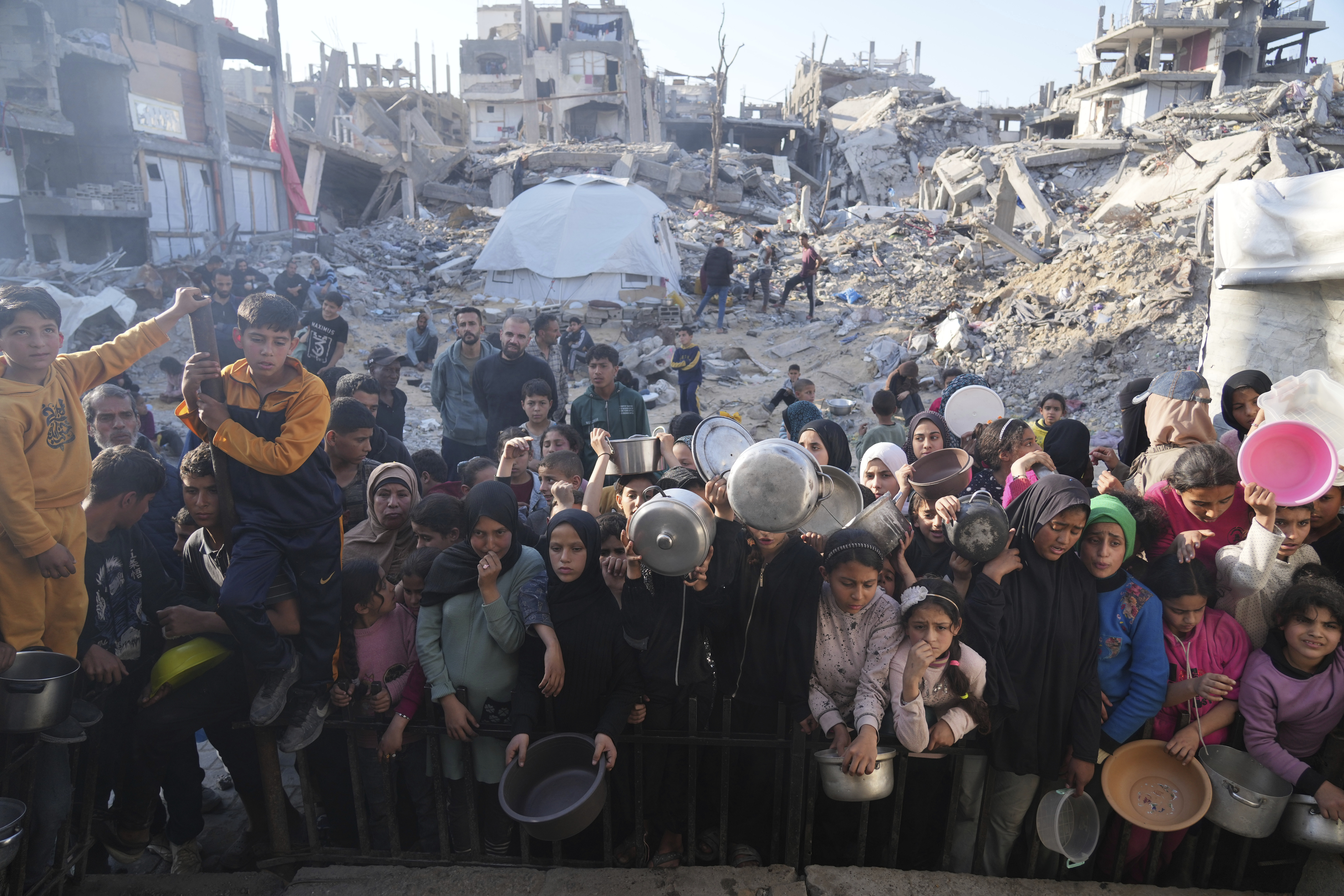 Families flee with few belongings as Gaza's shelters overflow, leaving many without tents or essential supplies.