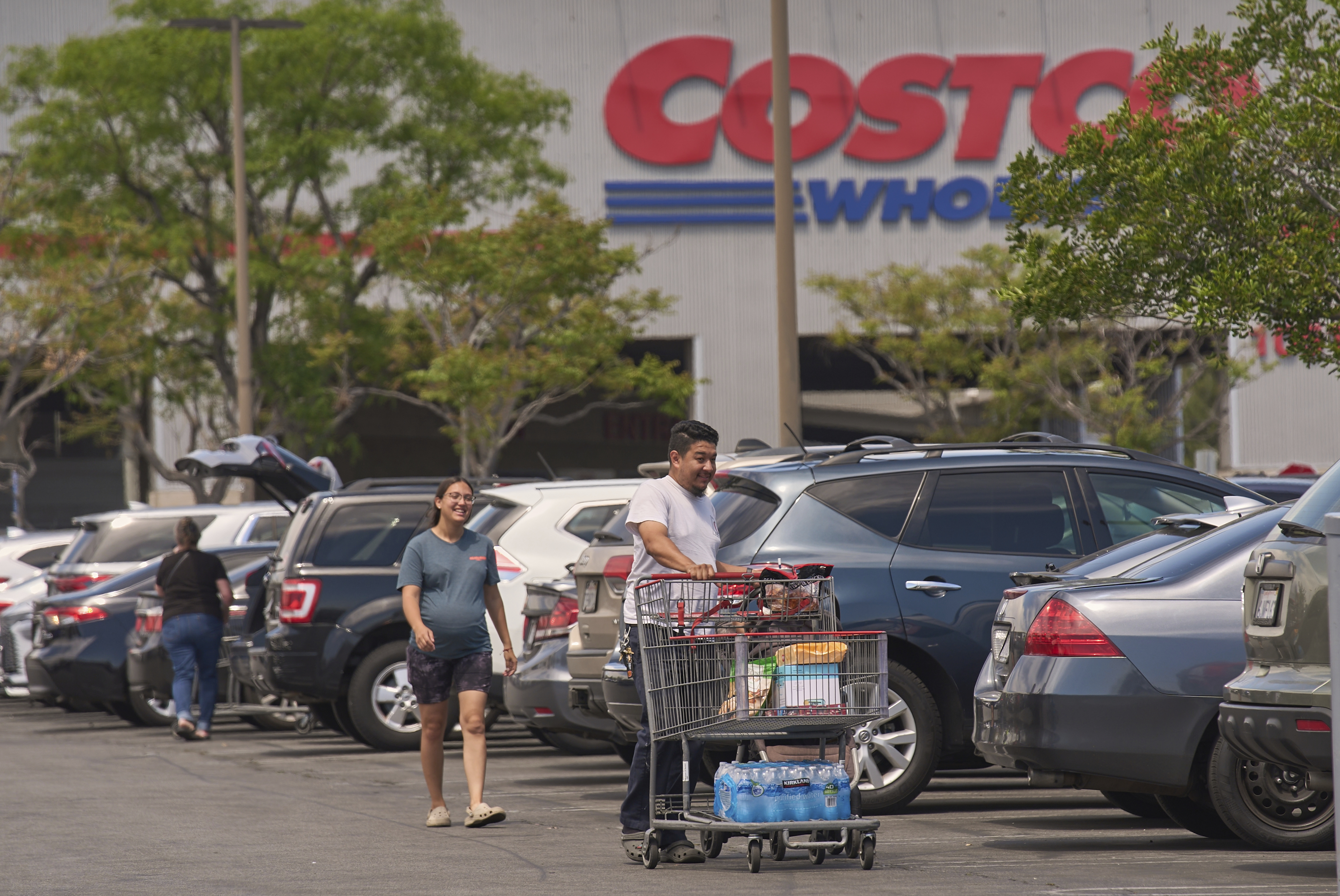 People shop for supplies at Costco Wholesale store in Burbank, US