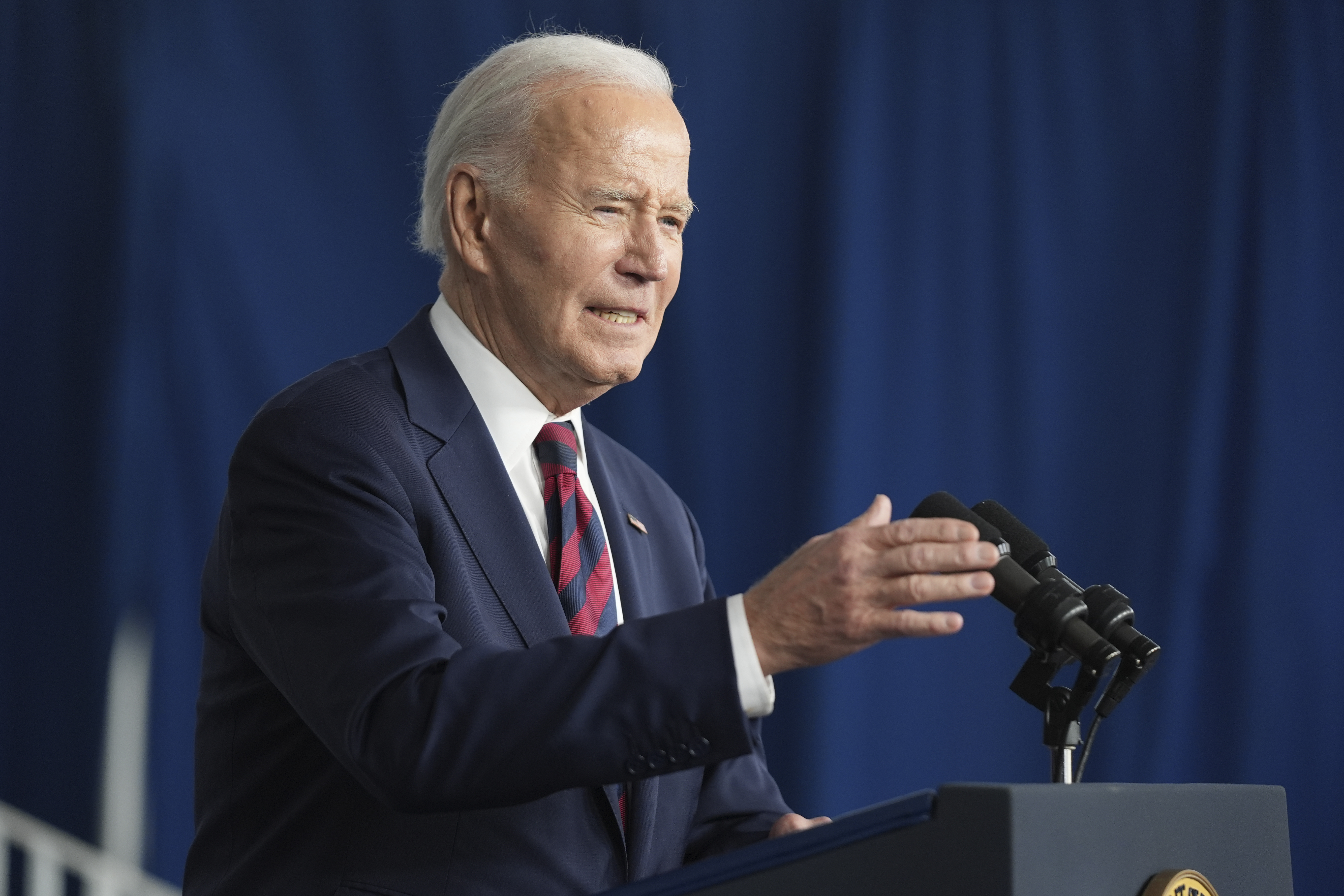Joe Biden speaks at a podium