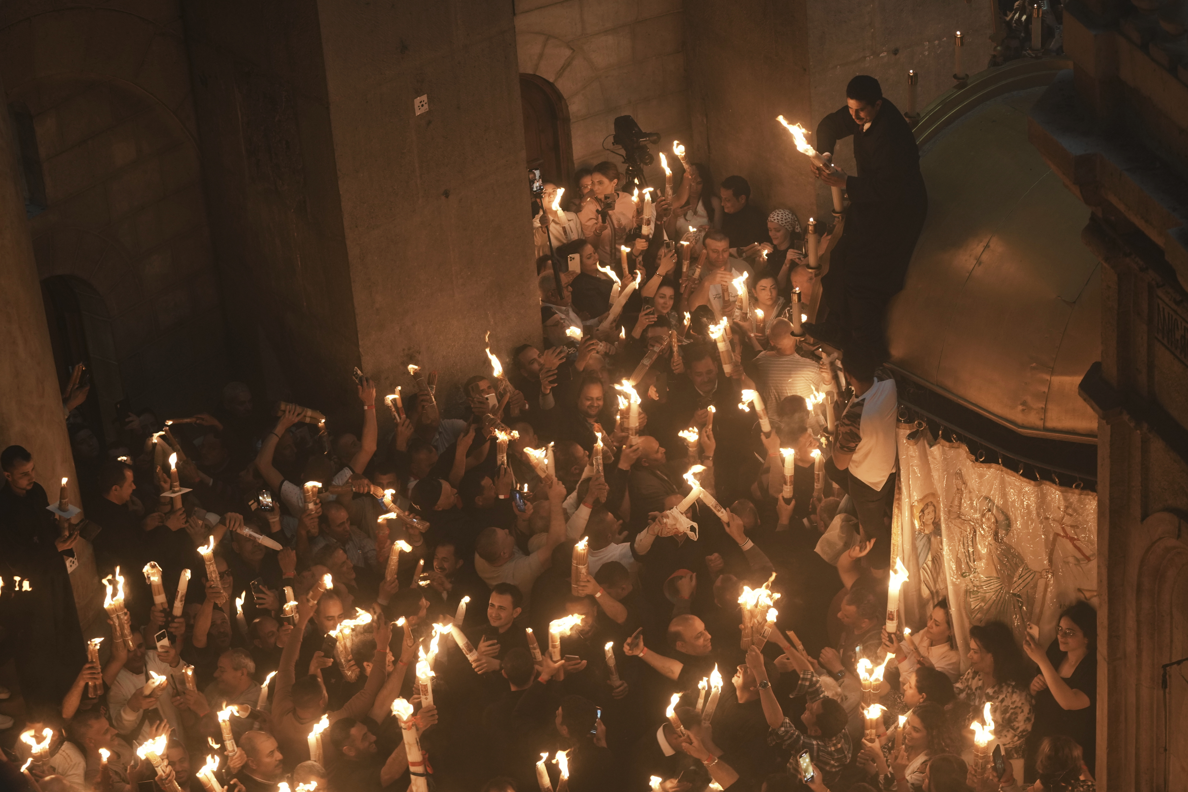 Thousands gather for centuries-old Holy Fire ceremony in Jerusalem
