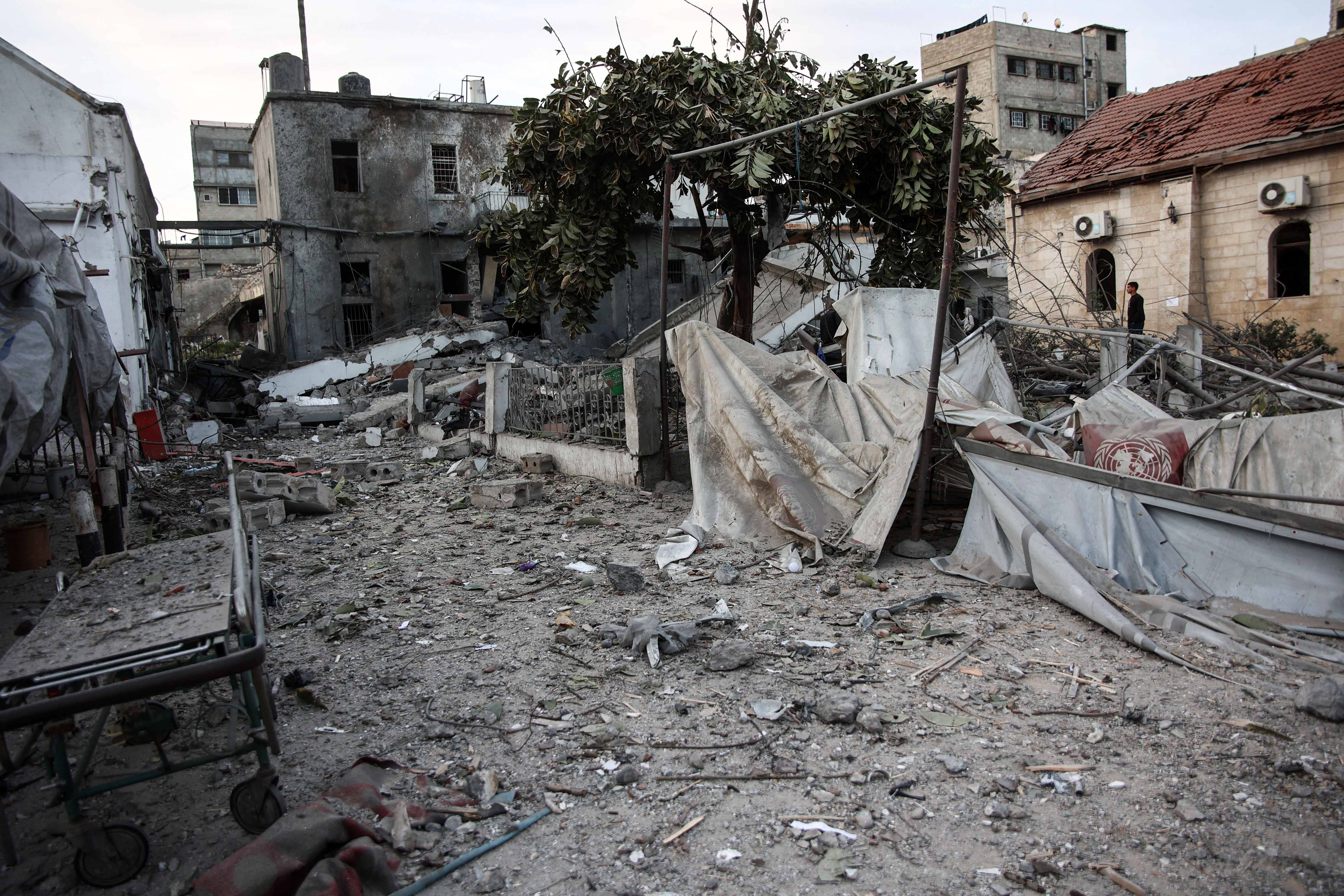 A gurney lies amid the debris in the aftermath of an Israeli strike on the Al-Ahli hospital, also known as the Baptist or Ahli Arab hospital, in Gaza City on April 13, 2025.