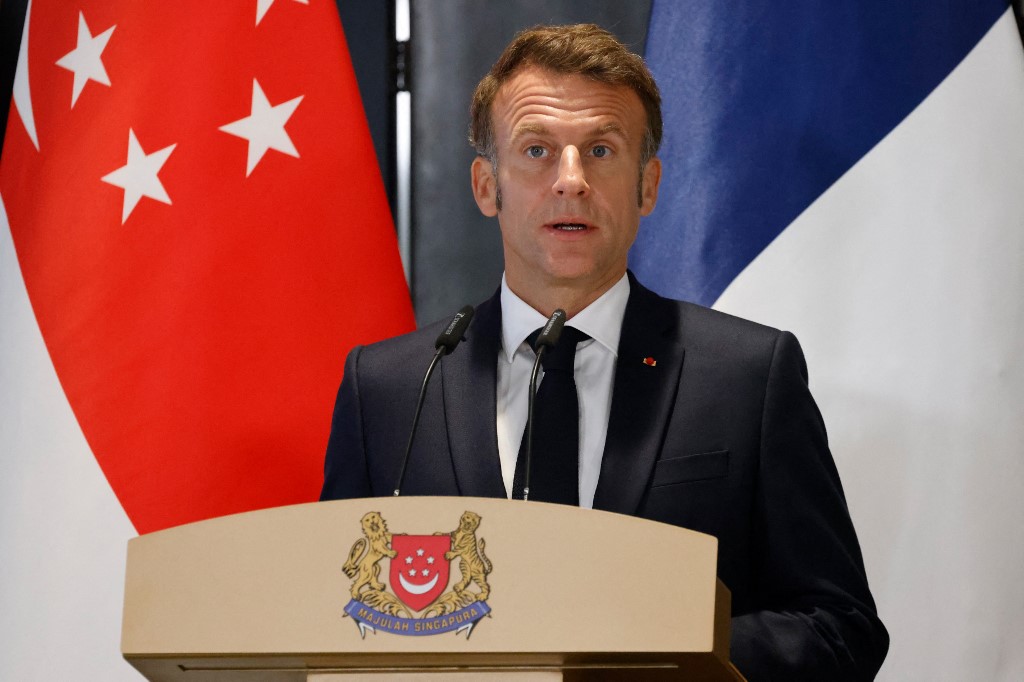 France's President Emmanuel Macron takes part in a press briefing with Singapore's Prime Minister Lawrence Wong in Singapore on May 30, 2025. [Ludovic Marin/AFP]