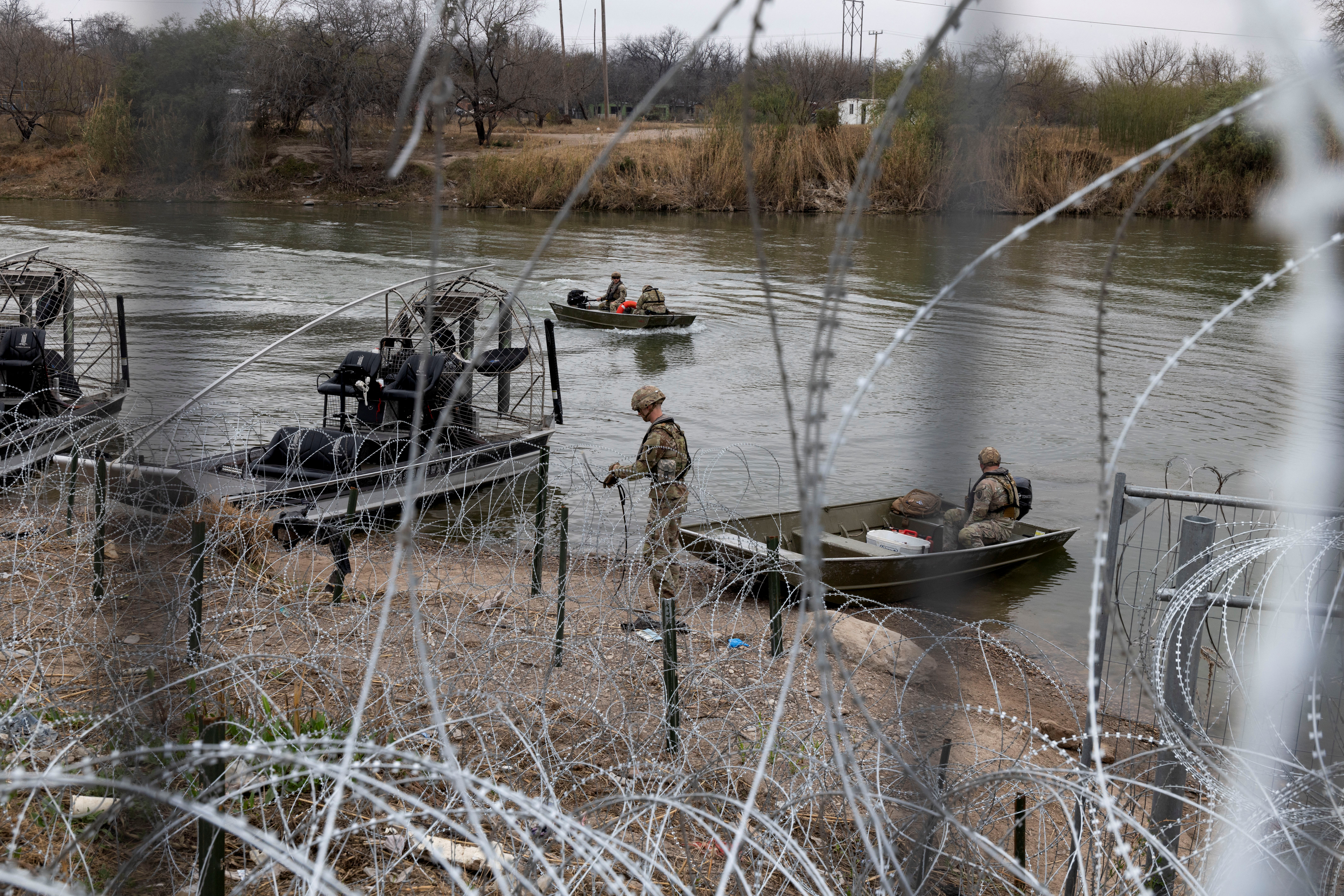 Army National Guard soldiers return from a boat patrol on the Rio Grande River at the U.S.-Mexico border in Eagle Pass, Texas, U.S., February 7, 2025. REUTERS/Kaylee Greenlee Beal