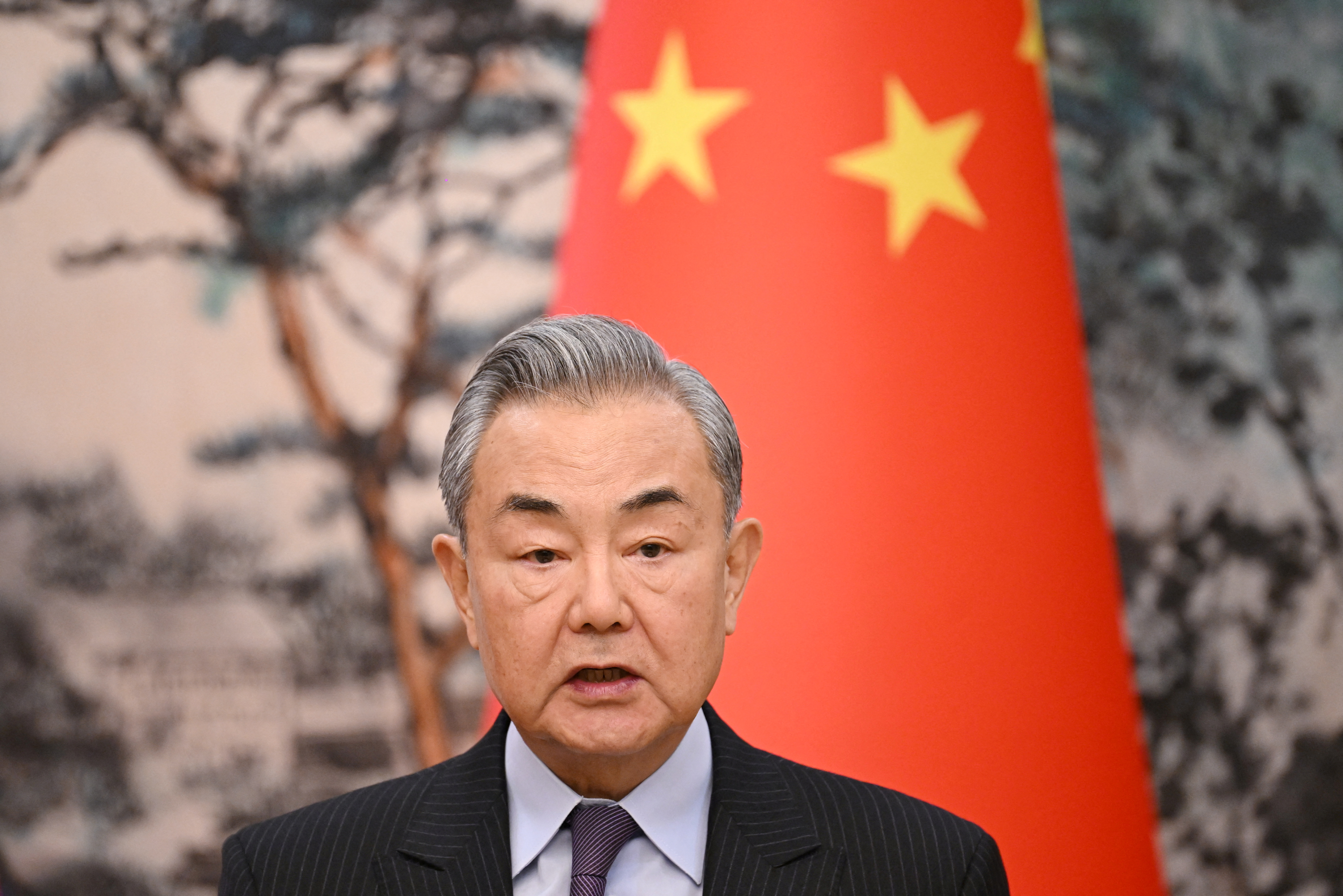 China’s Foreign Minister Wang Yi speaks during a joint briefing with French Foreign Minister Jean-Noel Barrot (not pictured) at the Diaoyutai State Guesthouse in Beijing, China on March 27, 2025