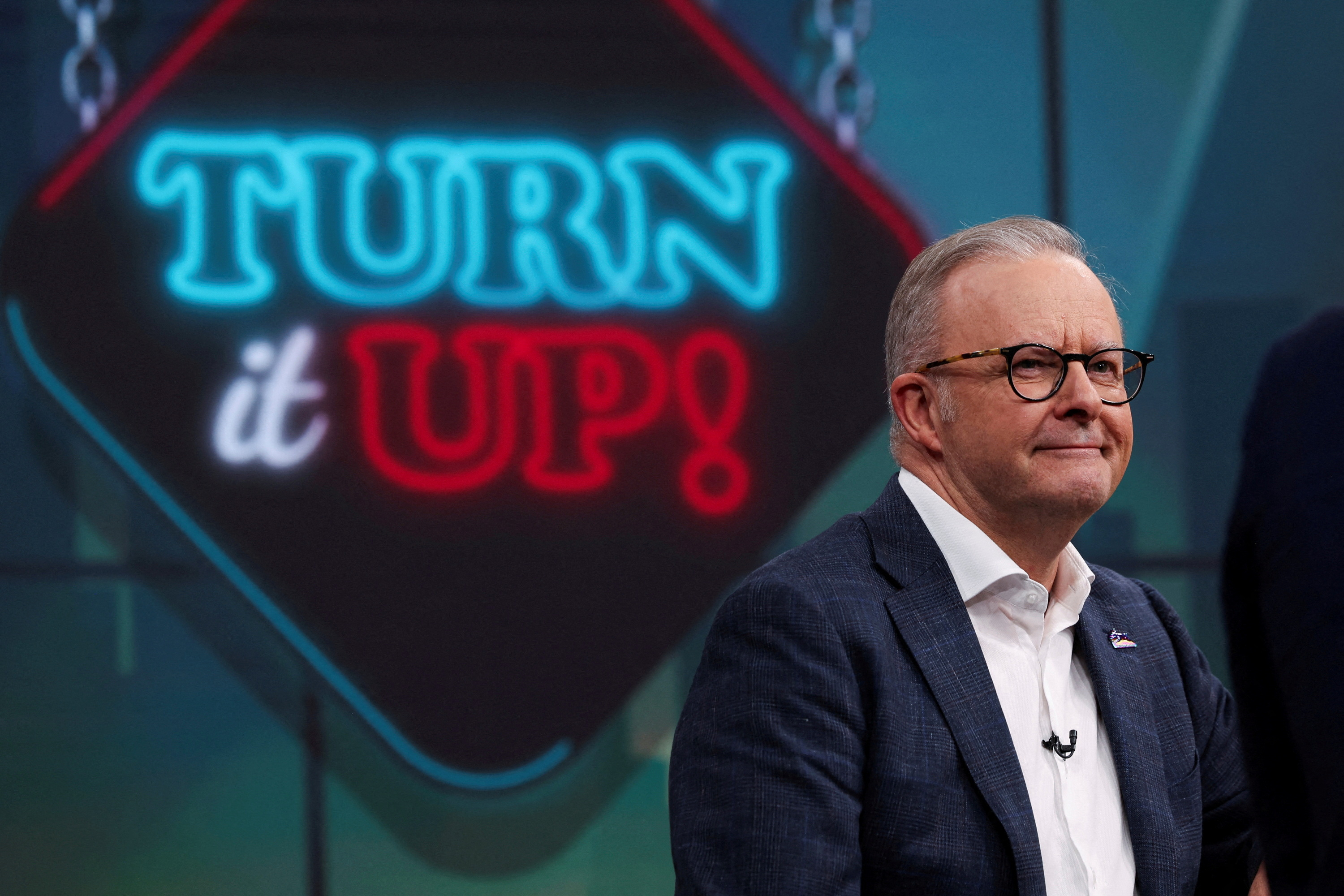 FILE PHOTO: Australian Prime Minister Anthony Albanese reacts during an appearance as a guest on the Sunday Footy Show during the federal election campaign in Sydney, Australia, April 20 2025. AAP Image/Alex Ellinghausen/Pool via REUTERS THIS IMAGE HAS BEEN SUPPLIED BY A THIRD PARTY NO RESALES. NO ARCHIVES AUSTRALIA OUT. NO COMMERCIAL OR EDITORIAL SALES IN AUSTRALIA NEW ZEALAND OUT. NO COMMERCIAL OR EDITORIAL SALES IN NEW ZEALAND/File Photo