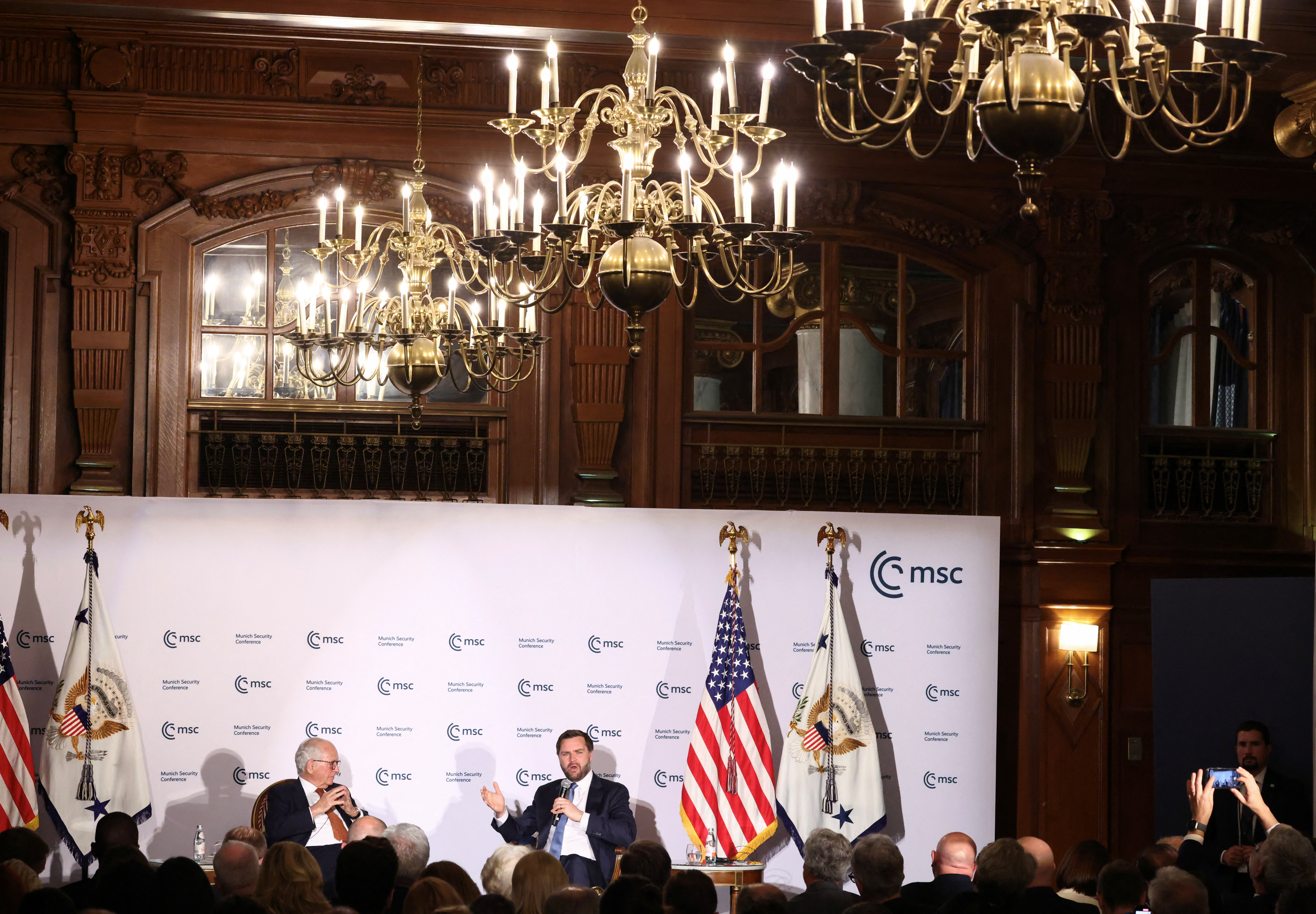 A long-lens view of the ballroom — topped with chandeliers — where the Munich leaders' conference was holding a Q&A with JD Vance.