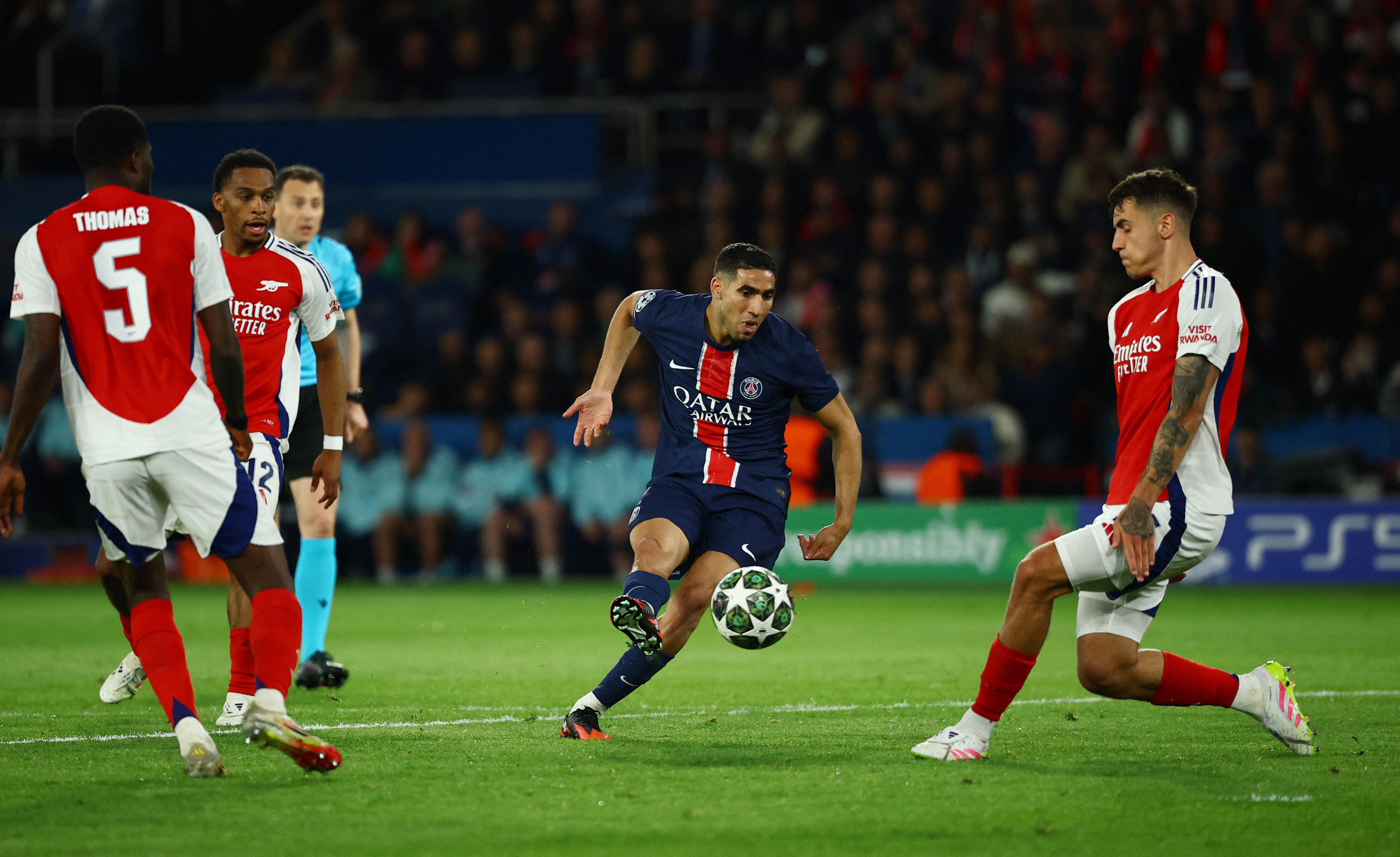 Soccer Football - Champions League - Semi Final - Second Leg - Paris St Germain v Arsenal - Parc des Princes, Paris, France - May 7, 2025 Paris St Germain's Achraf Hakimi scores their second goal REUTERS/Sarah Meyssonnier