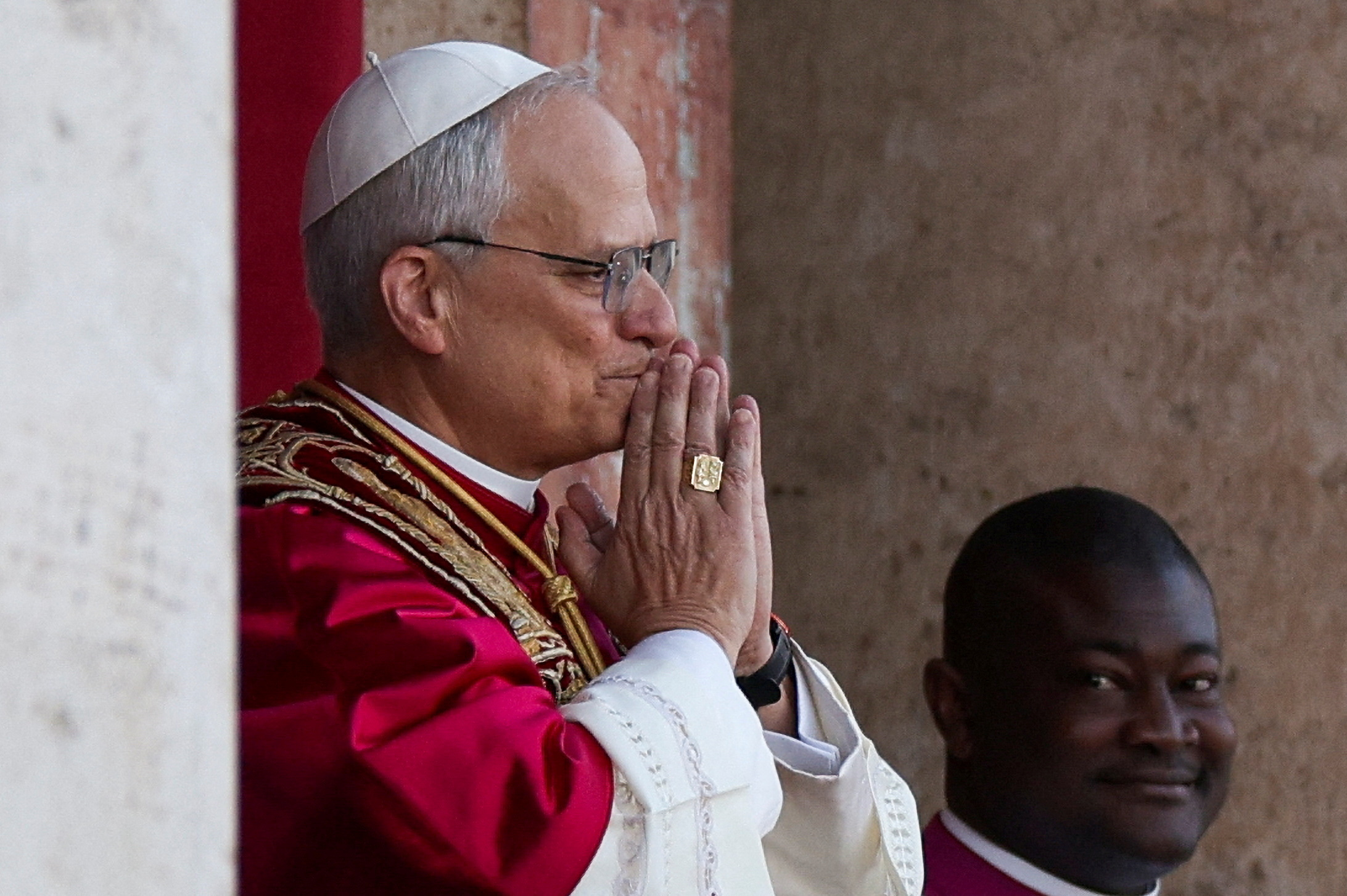 Newly elected Pope Leo XIV, Cardinal Robert Prevost of the United States, appears on the balcony of St. Peter's Basilica at the Vatican, May 8, 2025. REUTERS/Stoyan Nenov TPX IMAGES OF THE DAY