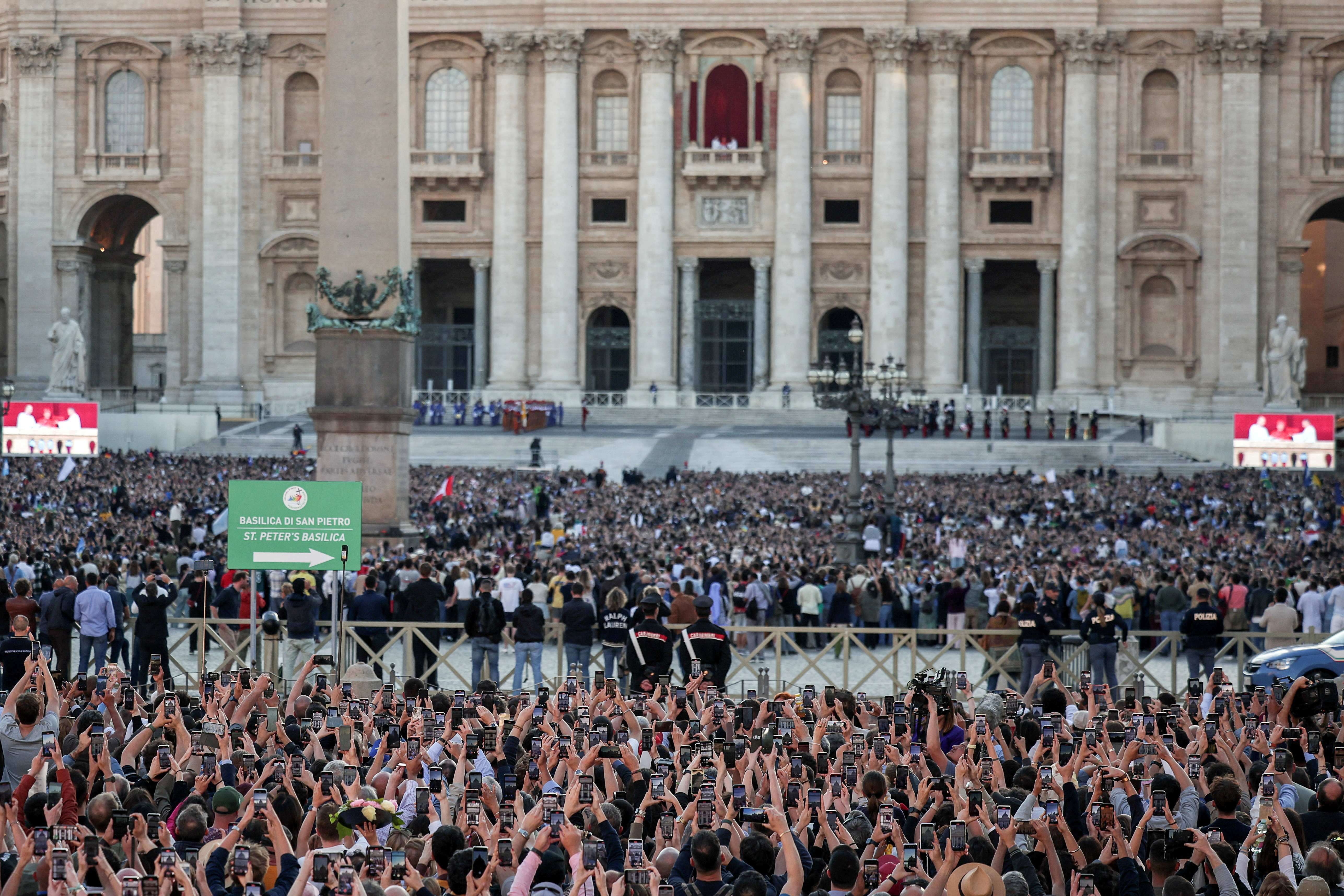 A crowd gathers in St Peter's Square