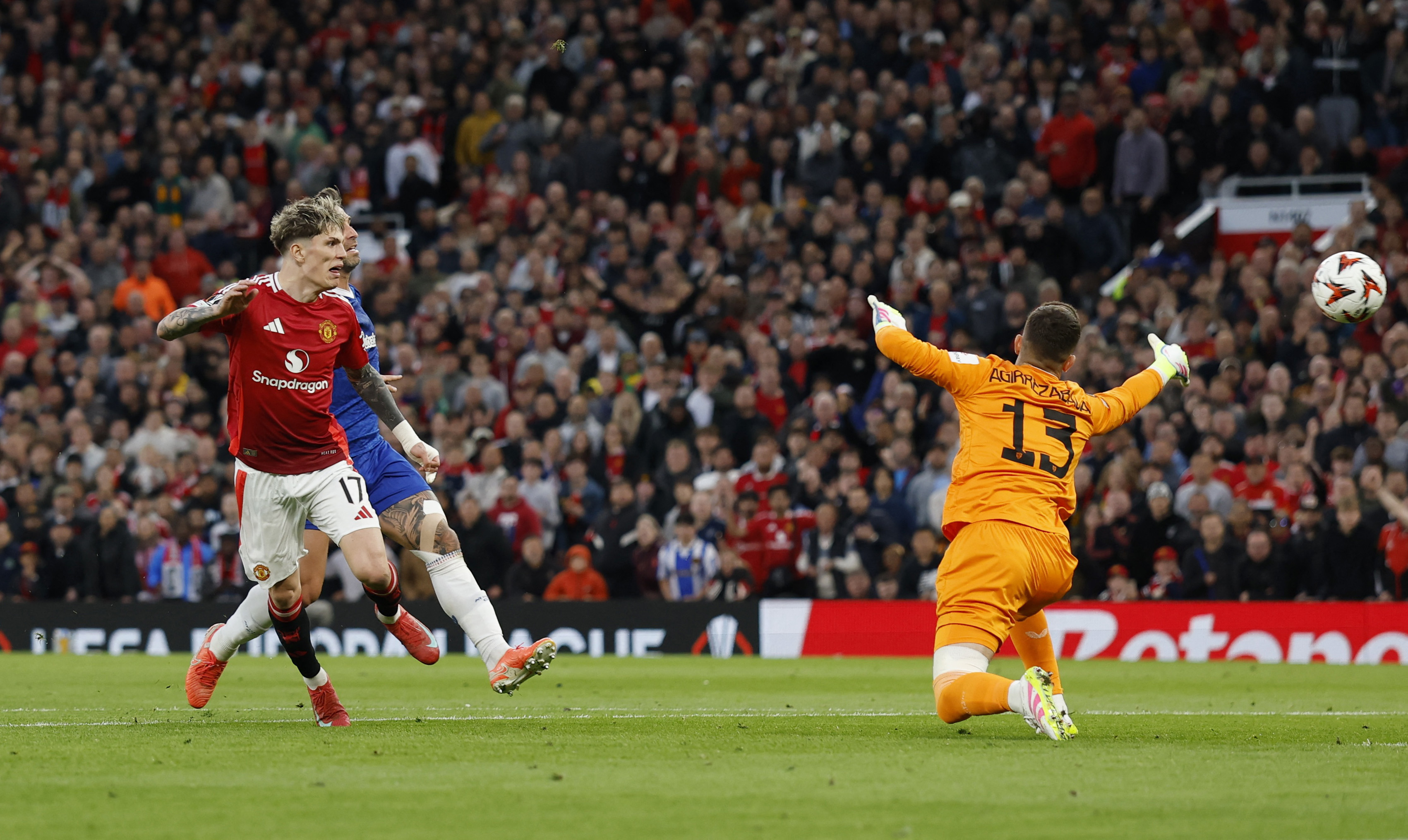 Soccer Football - Europa League - Semi Final - Second Leg - Manchester United v Athletic Bilbao - Old Trafford, Manchester, Britain - May 8, 2025 Manchester United's Alejandro Garnacho shoots at goal as Athletic Bilbao's Julen Agirrezabala reacts Action Images via Reuters/Jason Cairnduff
