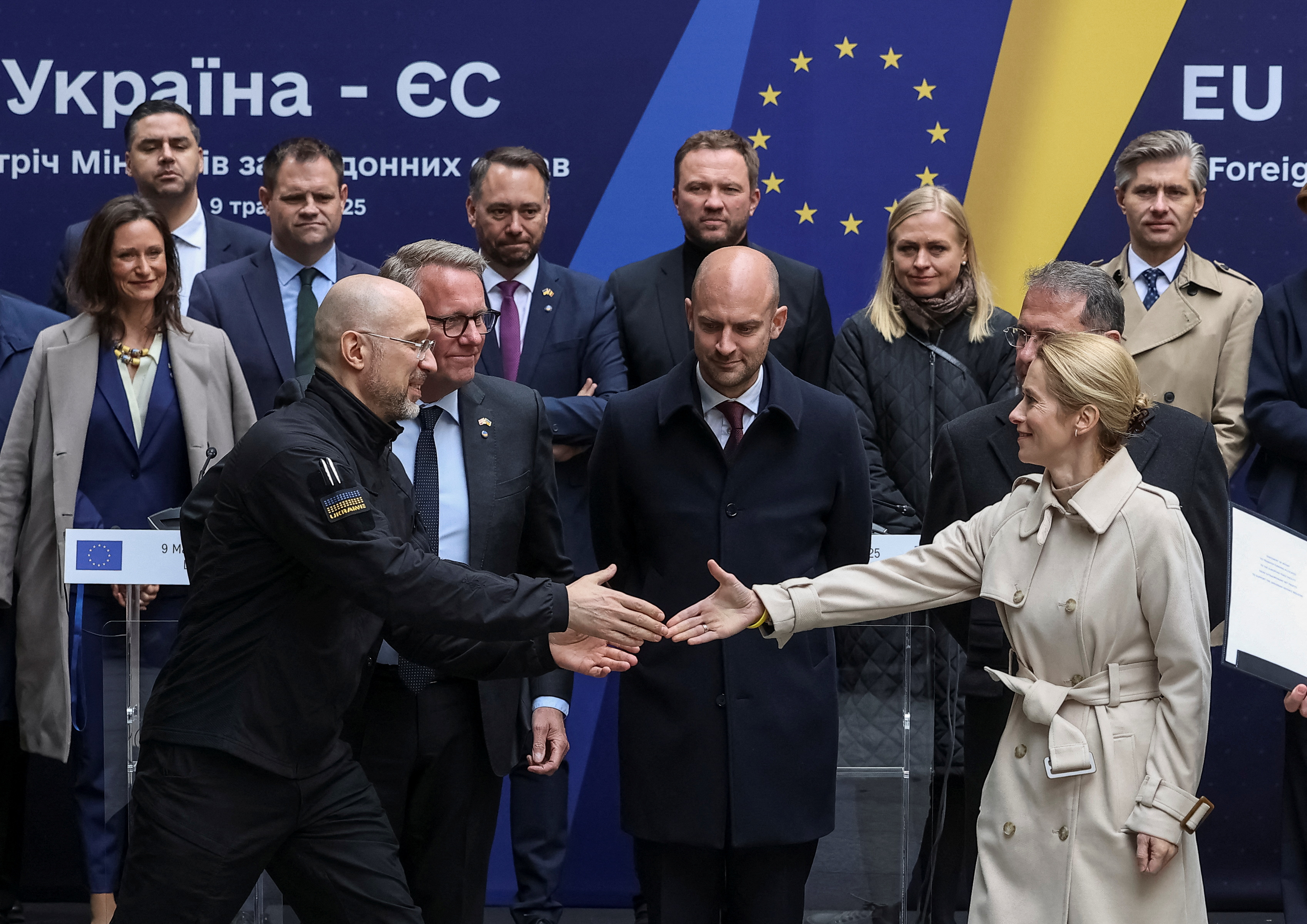 European Union High Representative for Foreign Affairs and Security Policy Kaja Kallas and Ukrainian Prime Minister Denys Shmyhal shake hands
