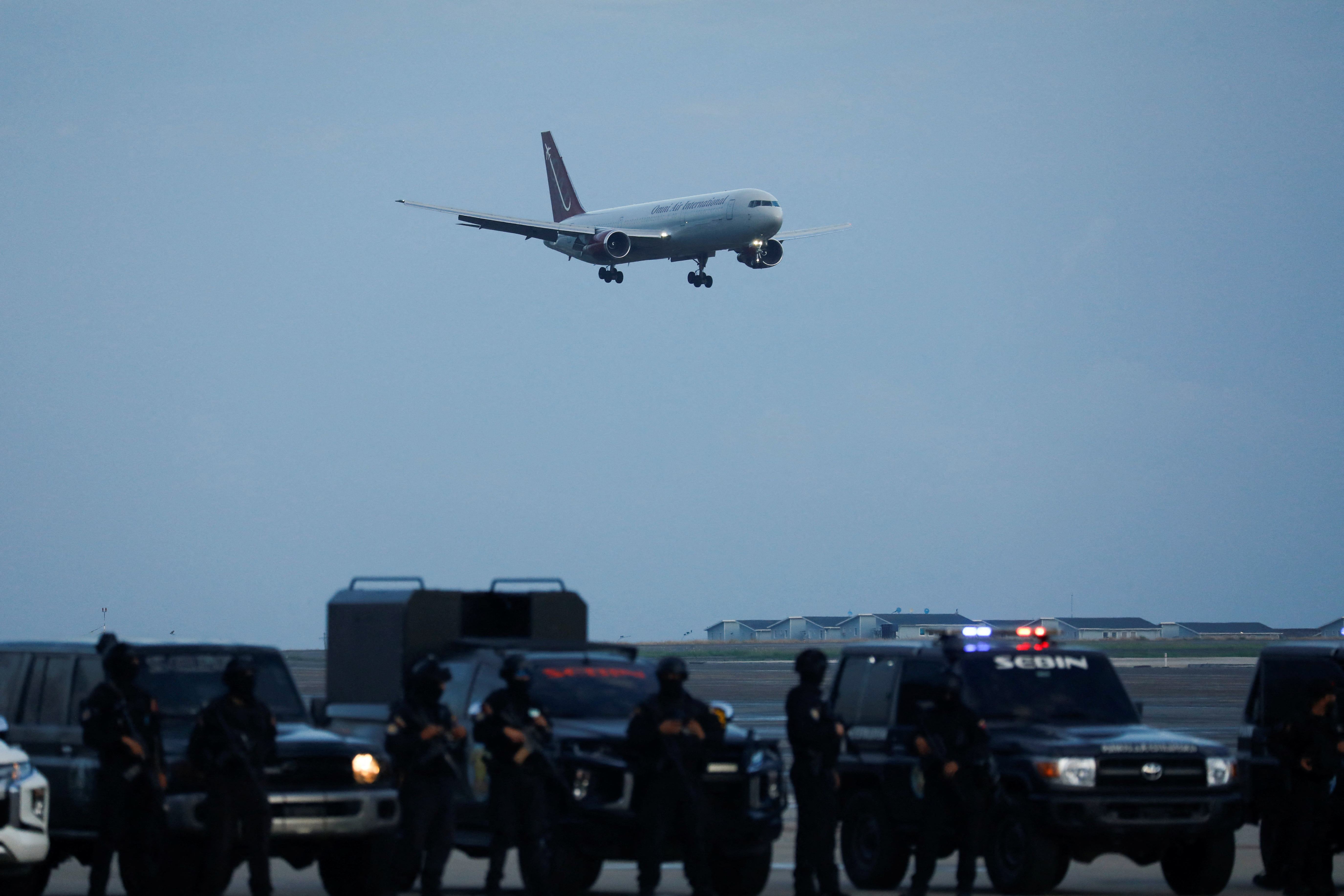 A deportation flight in mid-air.