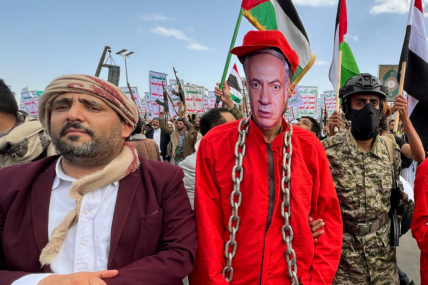 Demonstrators wear masks depicting Israeli Prime Minister Benjamin Netanyahu, as protesters, mainly Houthi supporters, rally in solidarity with Palestinians, in Sanaa, Yemen May 9, 2025.