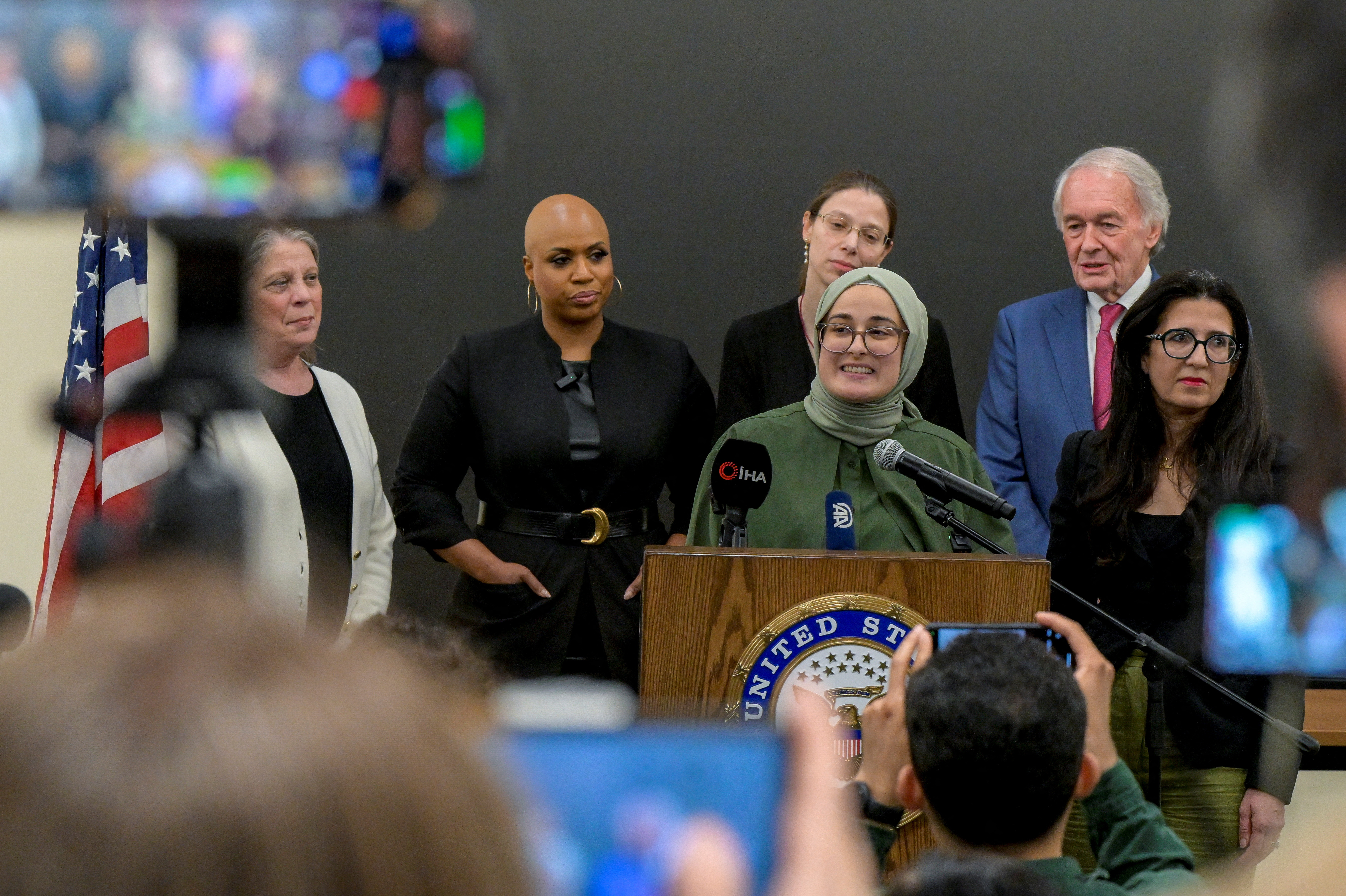 Tufts University student Rumeysa Ozturk, of Turkey, speaks at a press conference at Boston Logan International Airport after she was released on a judge's order after spending over six weeks in an immigration detention center in Louisiana, in Boston