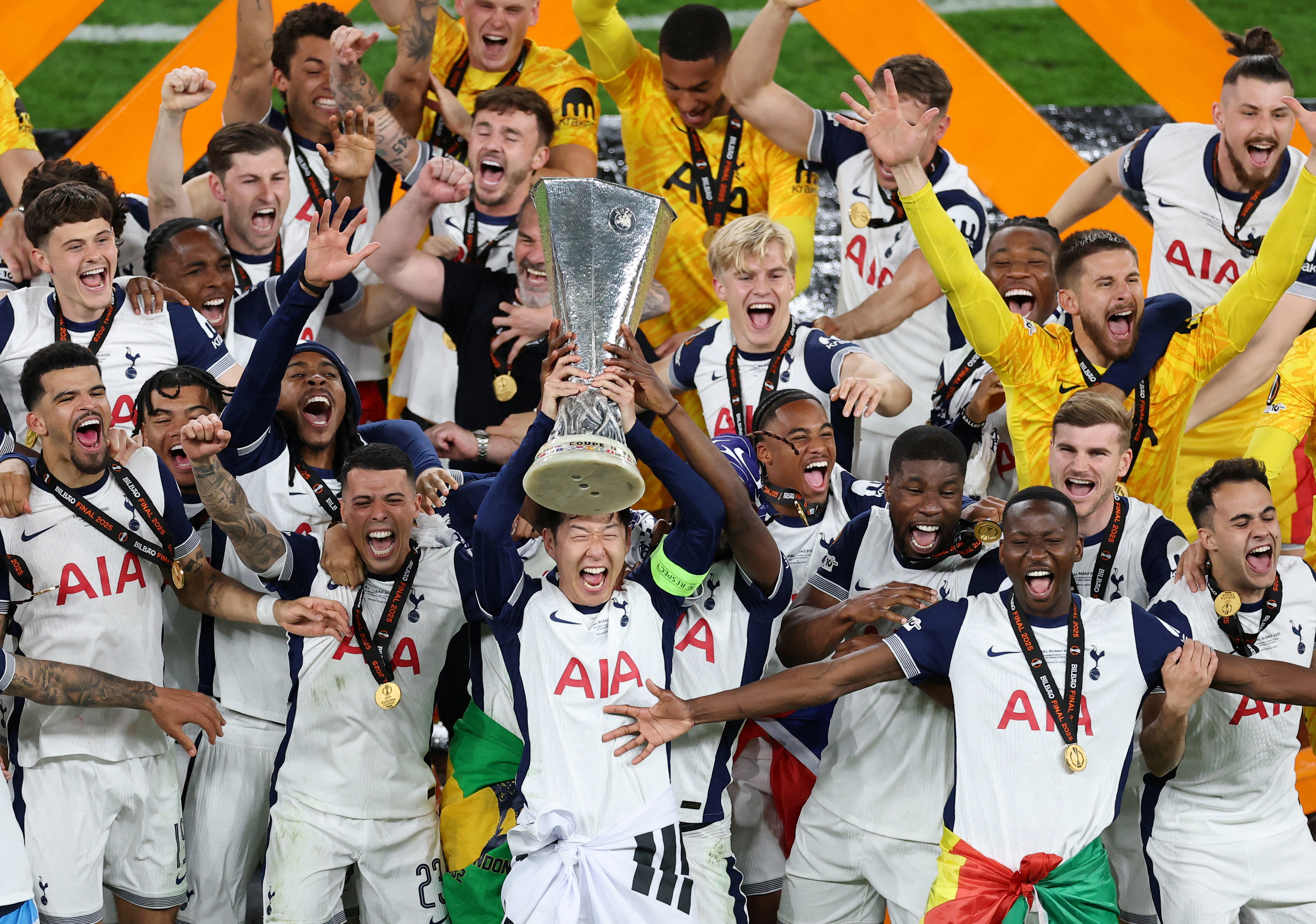 Europa League - Final - Tottenham Hotspur v Manchester United - San Mames, Bilbao, Spain - May 21, 2025 Tottenham Hotspur's Son Heung-min lifts the trophy as he celebrates with his teammates after winning the Europa League