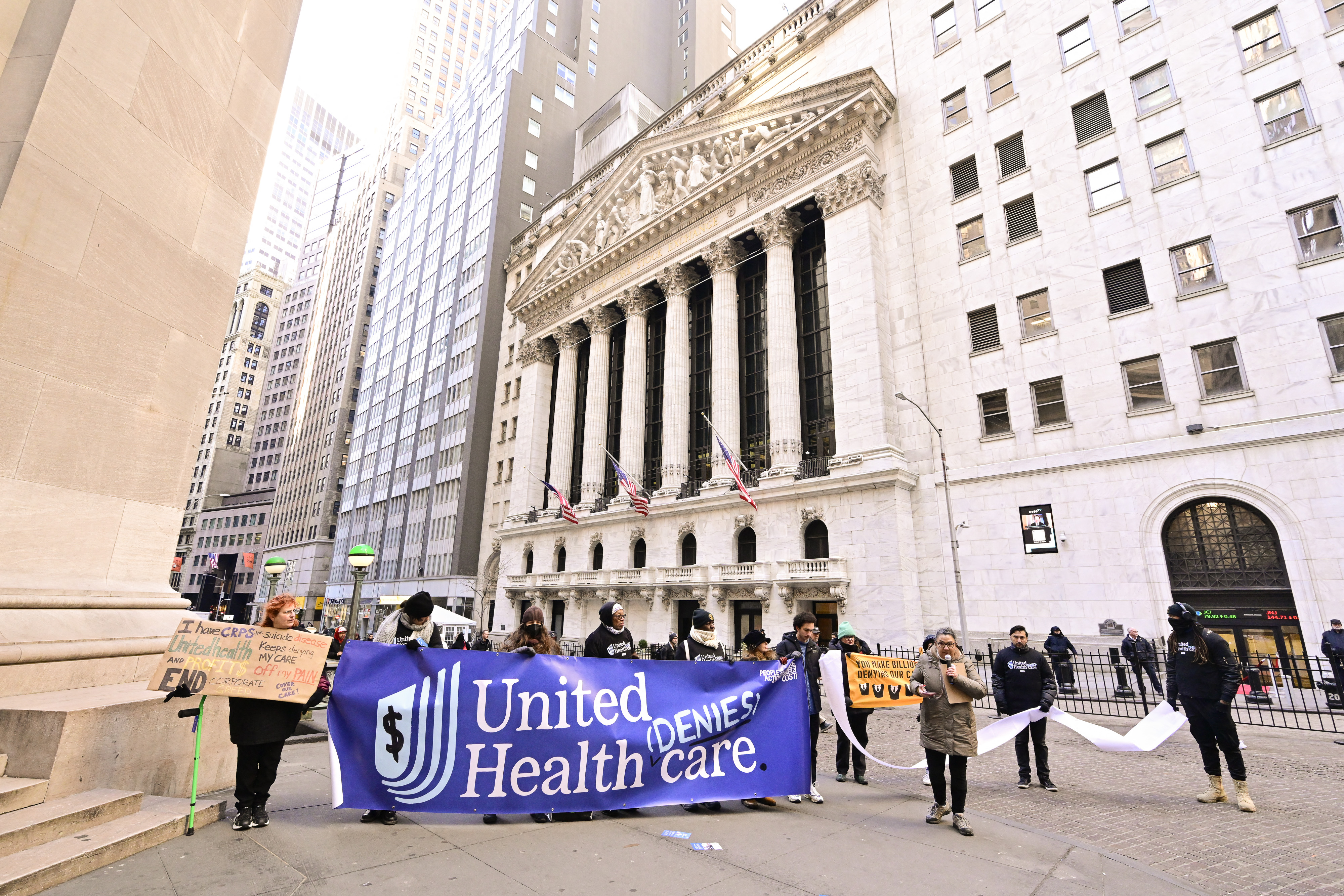 NEW YORK, NEW YORK - JANUARY 16: Patients & Doctors Denounce UnitedHealth On The Steps Of Wall Street As The Company's Record Profits Are Announced on January 16, 2025 in New York City. Eugene Gologursky/Getty Images for People's Action Institute/AFP (Photo by Eugene Gologursky / GETTY IMAGES NORTH AMERICA / Getty Images via AFP)