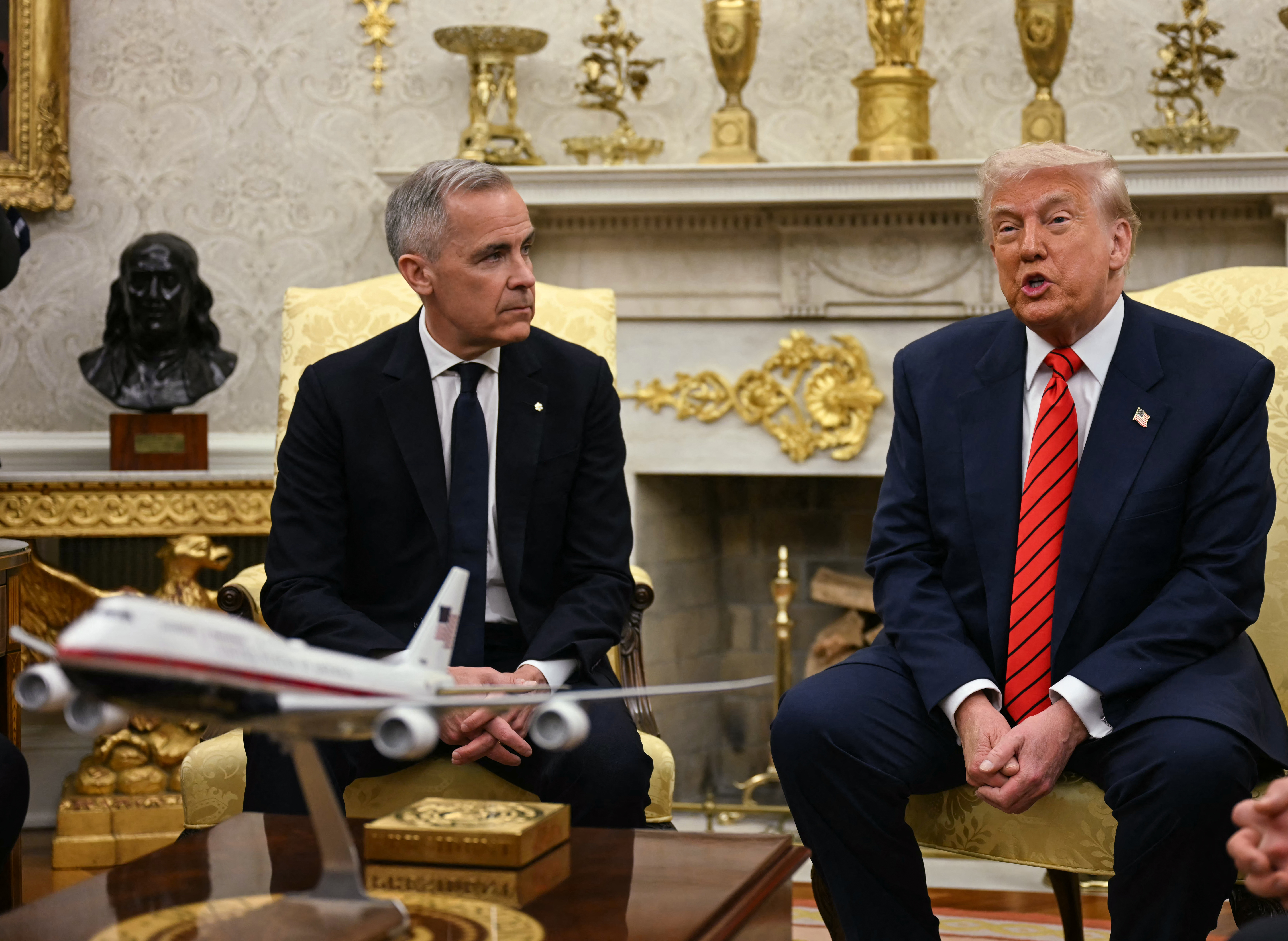 US President Donald Trump meets with Canadian Prime Minister Mark Carney in the Oval Office of the White House.