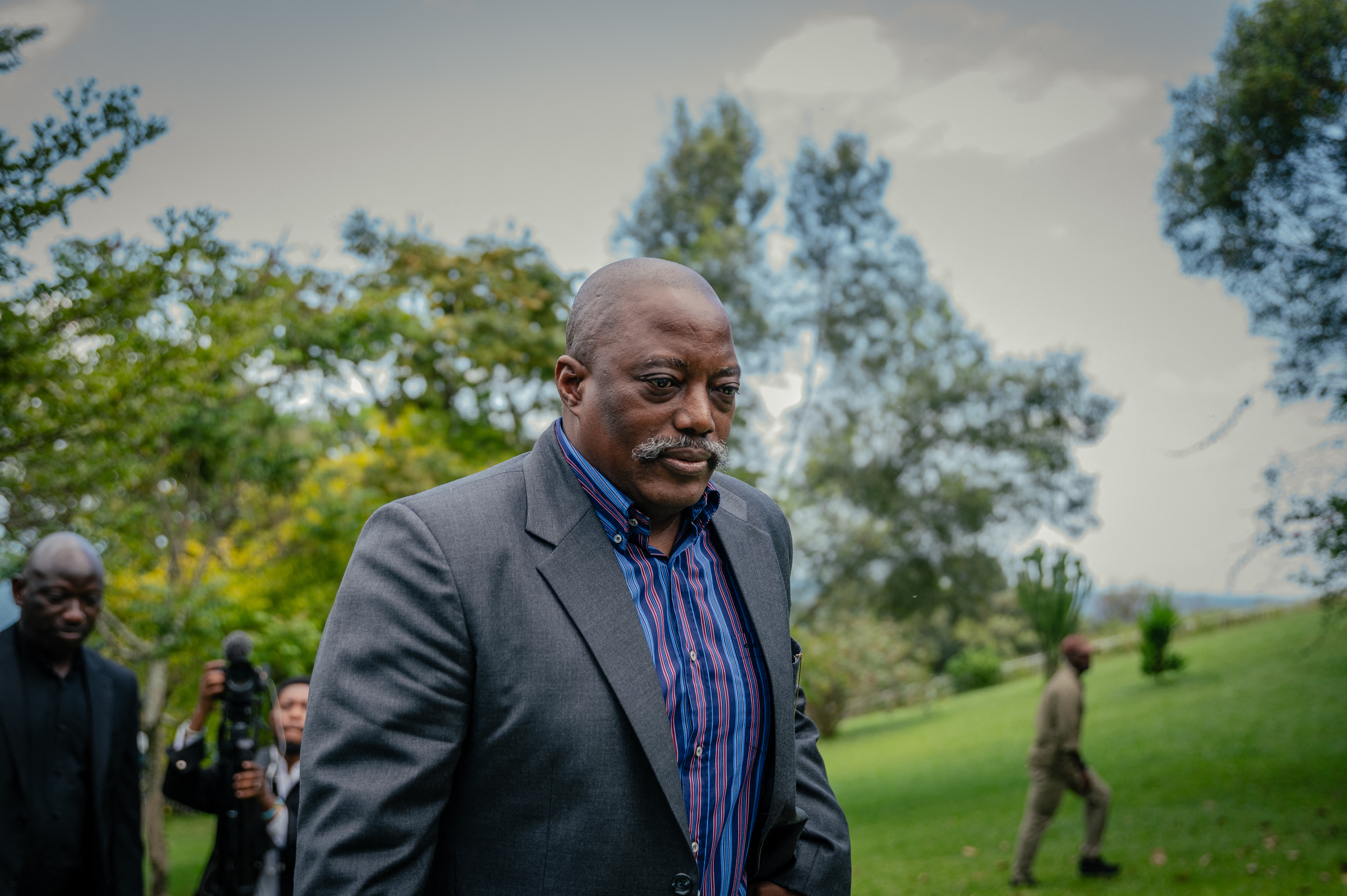 Joseph Kabila in a dark suit