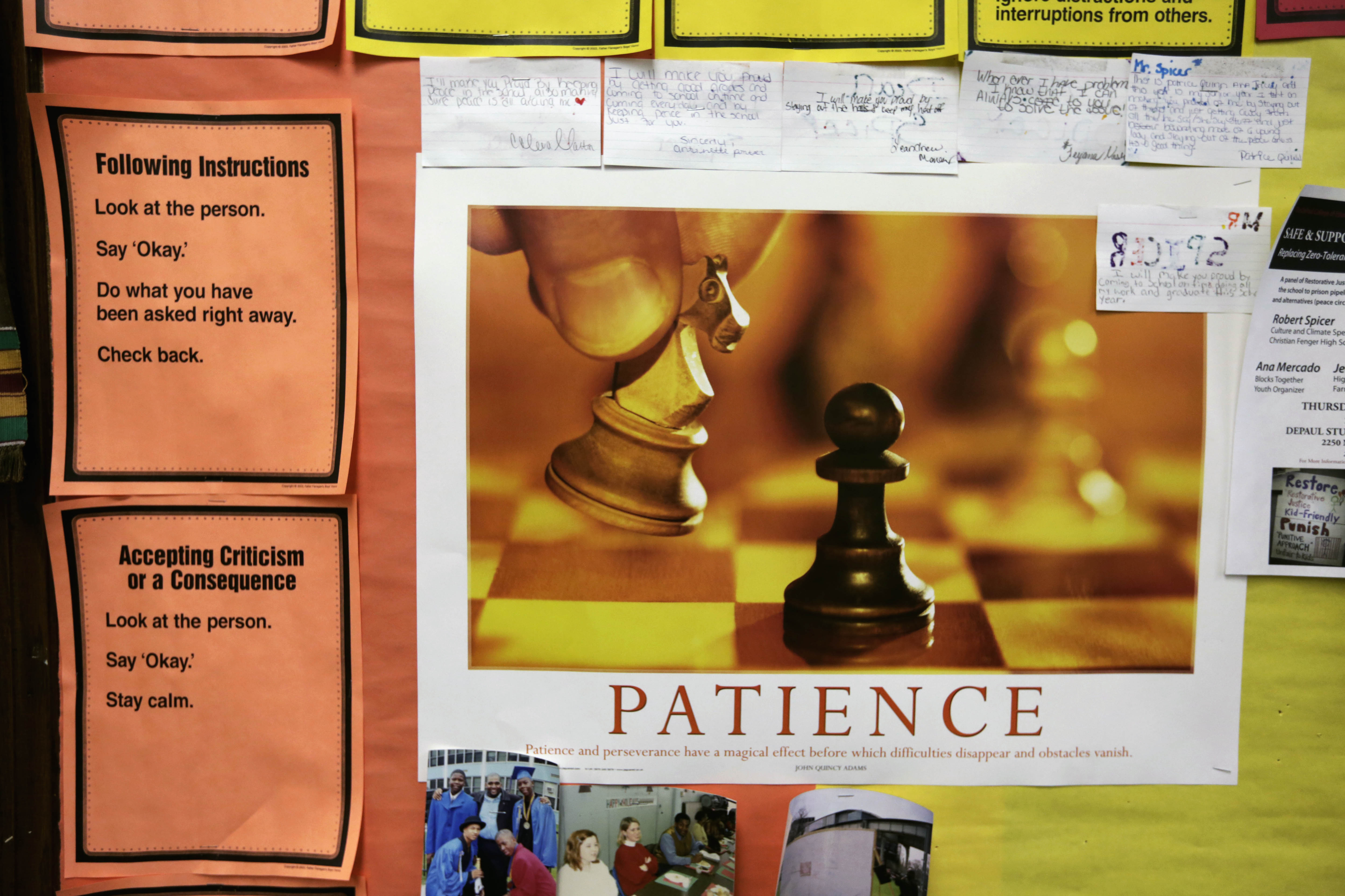 Notes and inspirational messages tacked to a wall in a room at Fenger High School in Chicago, US