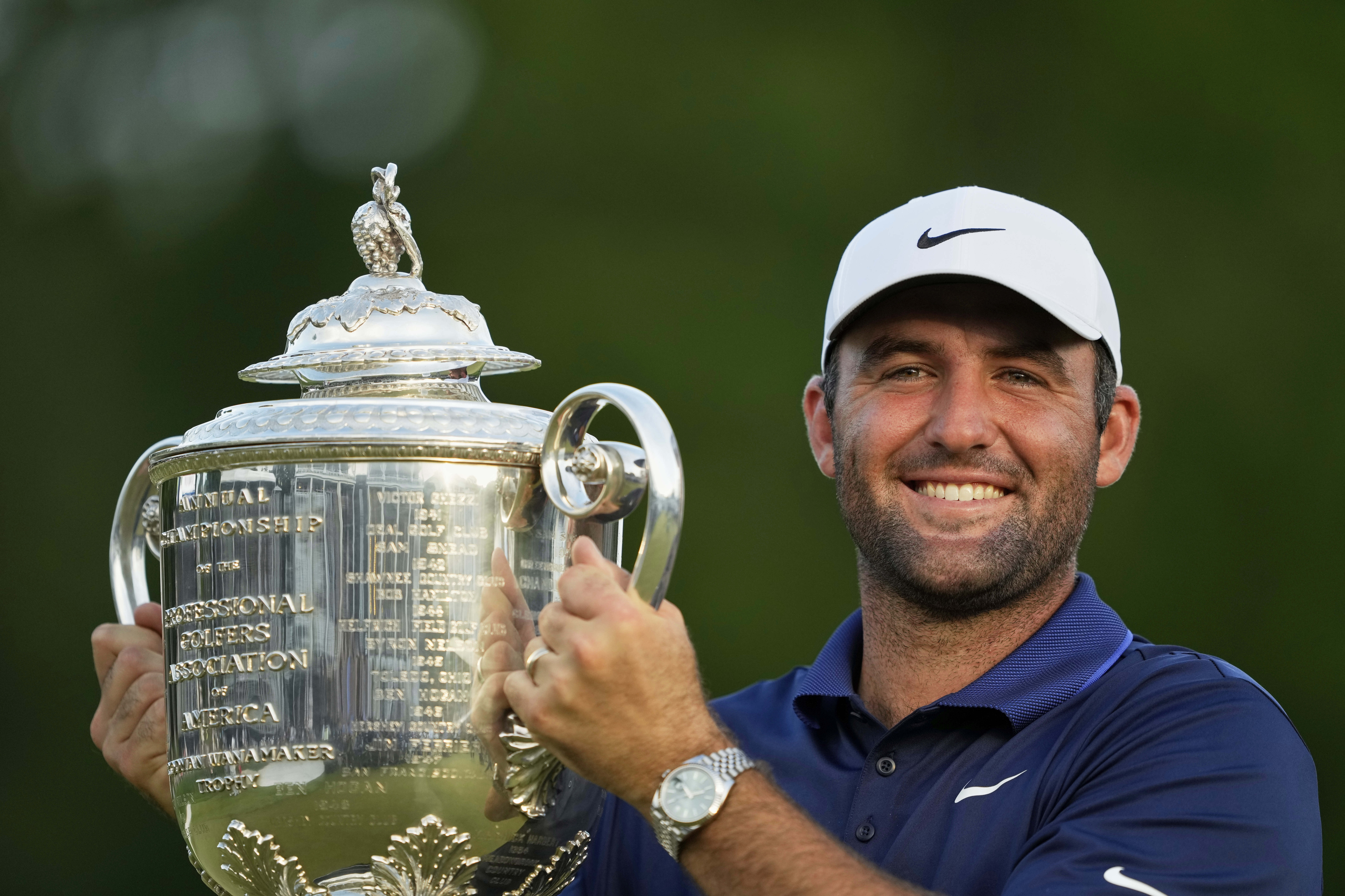 Scottie Scheffler reacts.