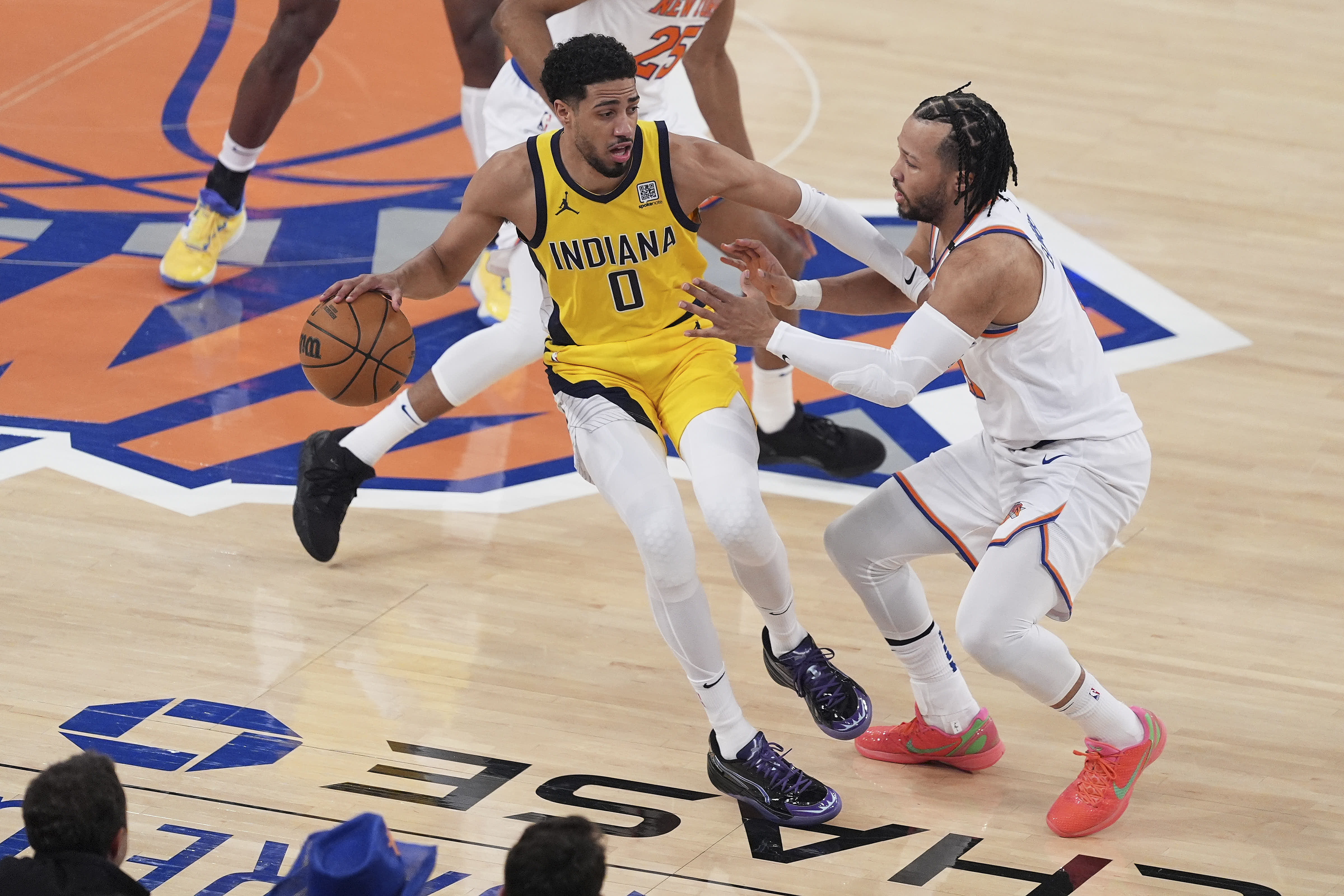 Indiana Pacers guard Tyrese Haliburton (0) drives against New York Knicks guard Jalen Brunson (11) during the first quarter of Game 5 of the NBA basketball Eastern Conference final