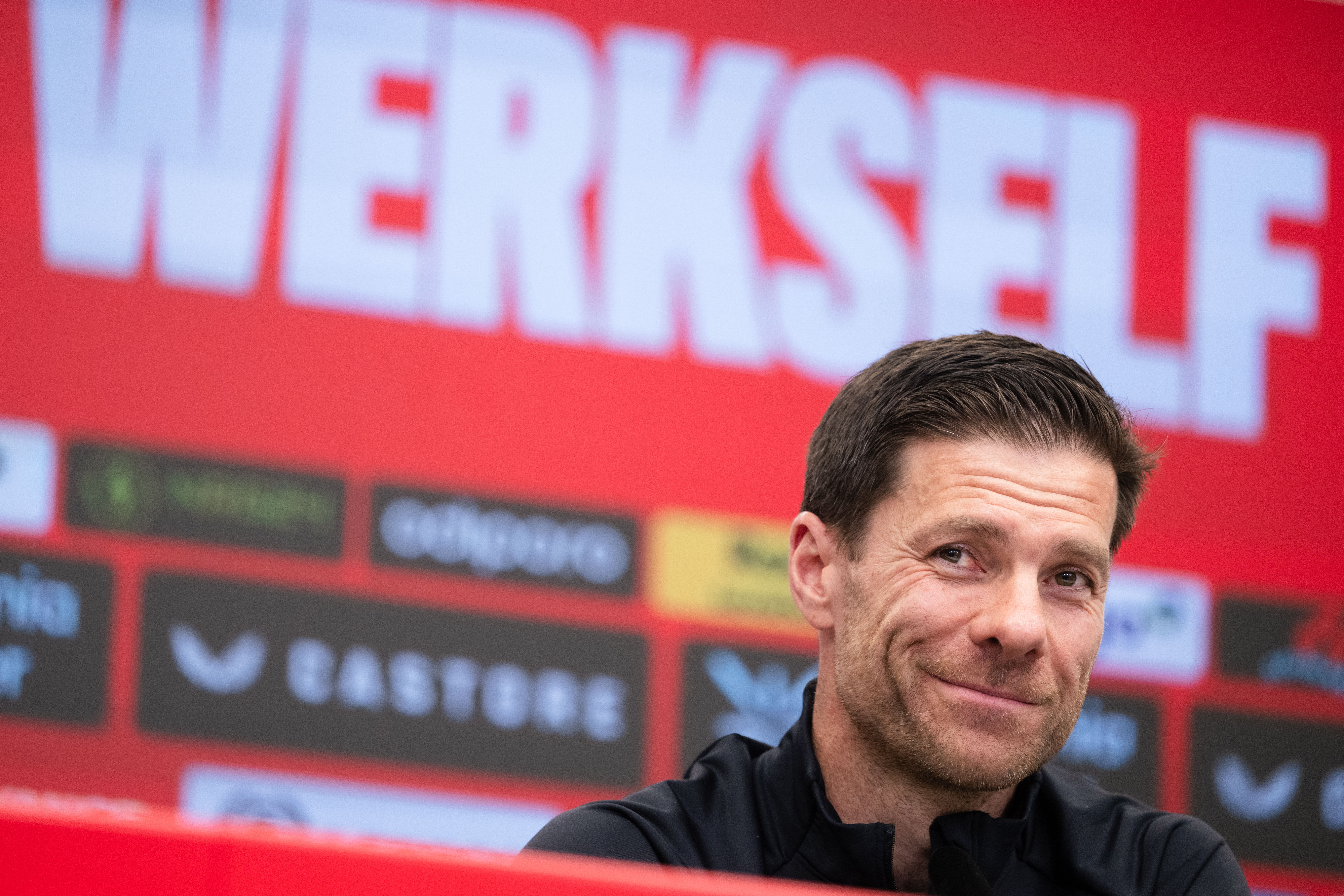 dpatop - 09 May 2025, North Rhine-Westphalia, Leverkusen: Soccer: Bundesliga, Bayer Leverkusen press conference ahead of the match against Borussia Dortmund. Leverkusen coach Xabi Alonso looks ahead. Alonso will leave Leverkusen after the season. Photo: Marius Becker/dpa (Photo by Marius Becker/picture alliance via Getty Images)
