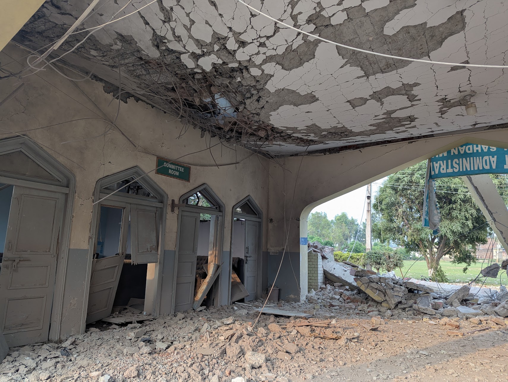 The roof of the administration block, where one of the bodies was found, was close to collapsing after the strike. [Abid Hussain/Al Jazeera]