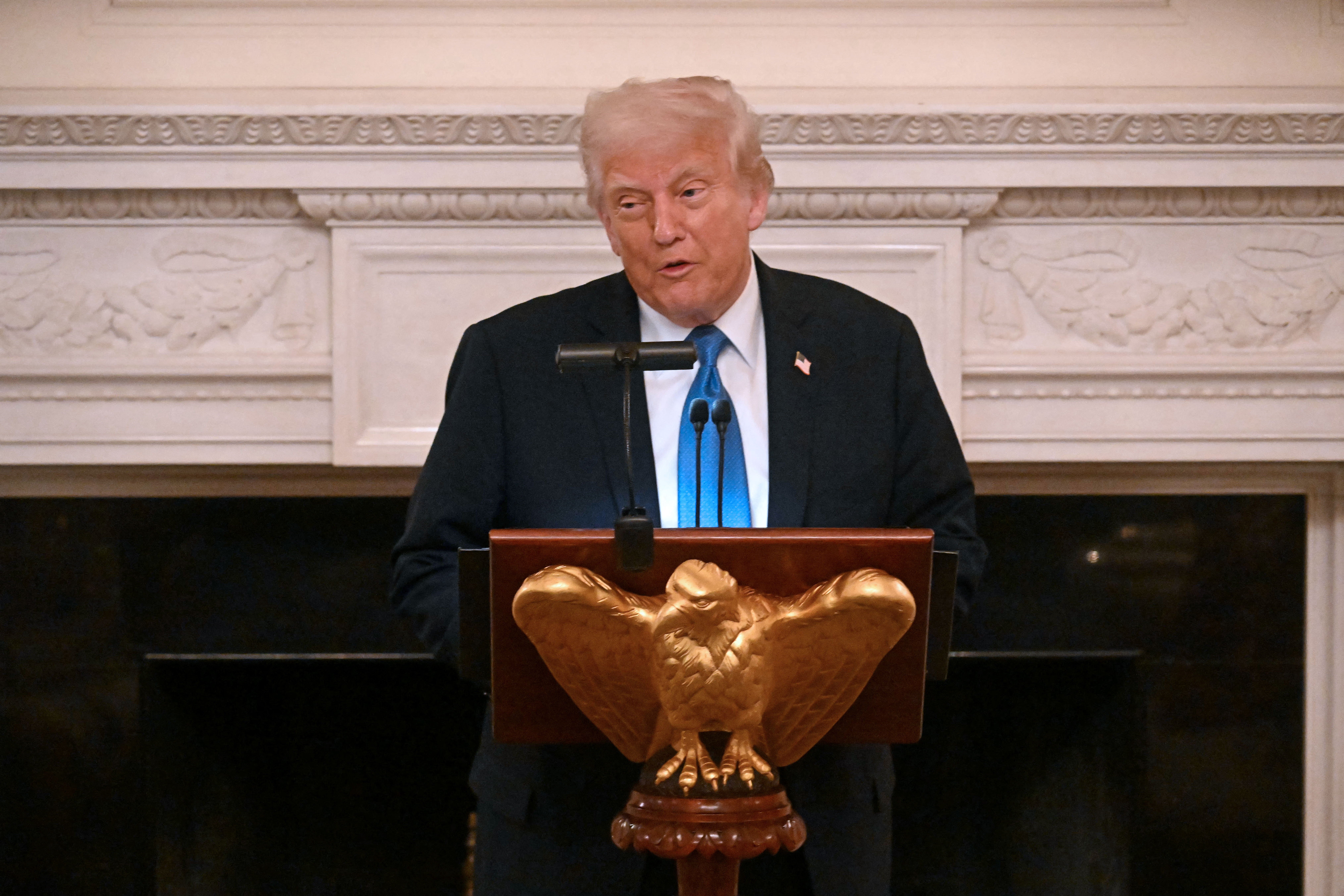 US President Donald Trump speaks during a Kennedy Center Board dinner in the State Dining Room of the White House in Washington, DC, on May 19, 2025. (Photo by Jim WATSON / AFP)