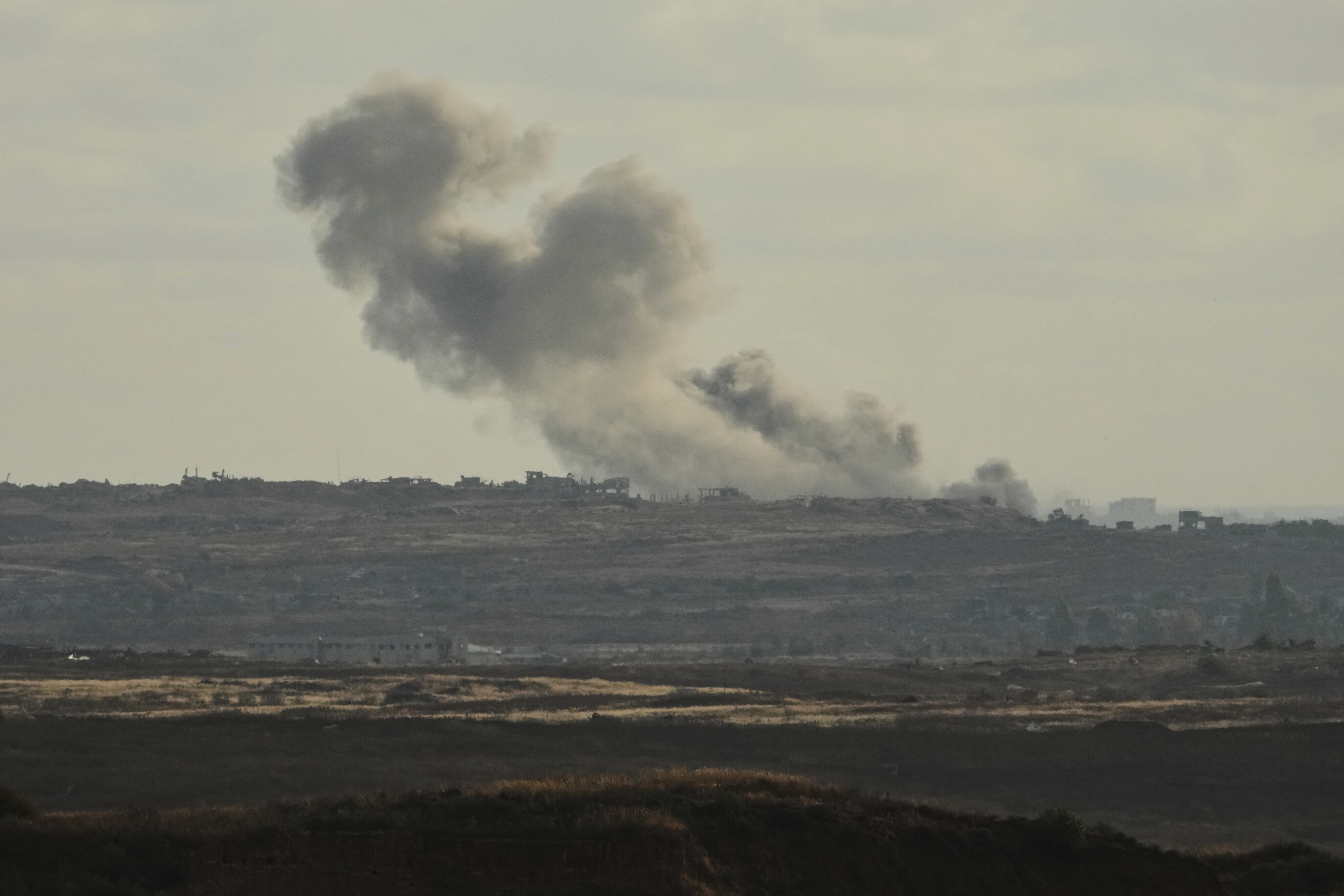 Smoke rises following an Israeli airstrike in the Gaza Strip, as seen from southern Israel, Sunday, May 4, 2025. (AP Photo/Ariel Schalit)