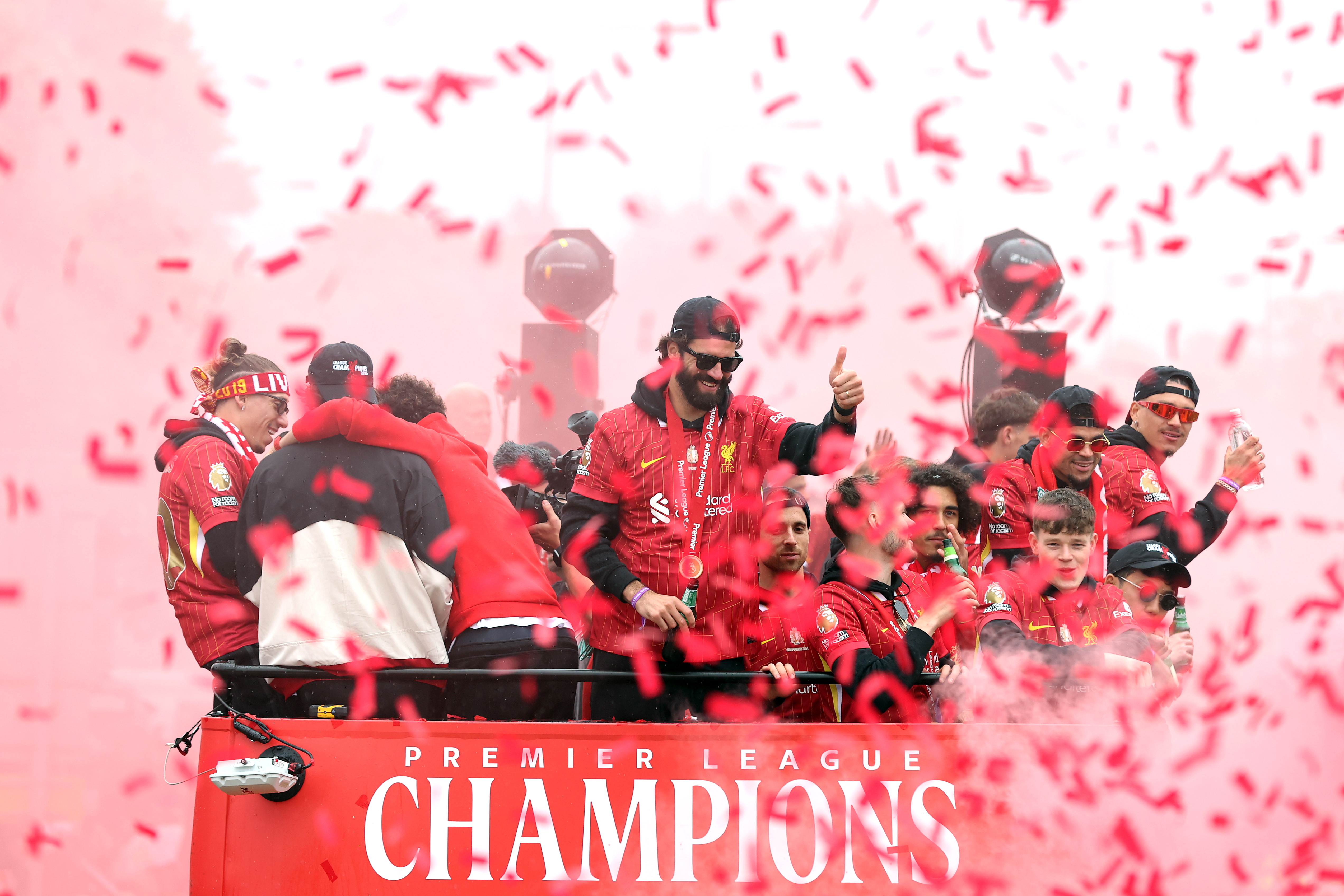 LIVERPOOL, ENGLAND - MAY 26: Alisson Becker celebrates with fans during Liverpool Premier League Trophy Parade on May 26, 2025 in Liverpool, England. (Photo by Jan Kruger/Getty Images)