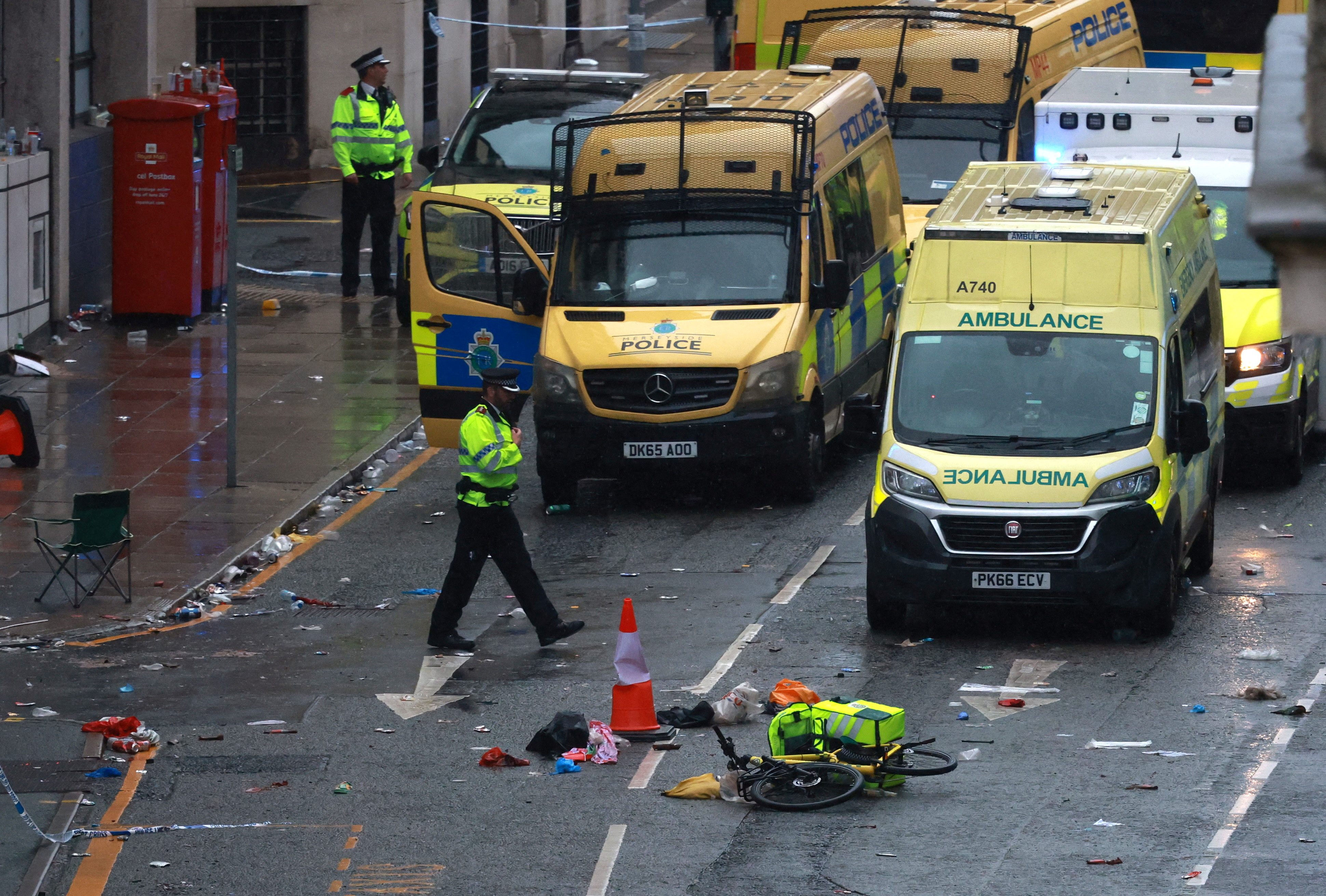 Soccer Football - Premier League - Liverpool Victory Parade - Liverpool, Britain - May 26, 2025 Emergency services at the scene after multiple people were hit by a car during the Victory parade REUTERS/Phil Noble TPX IMAGES OF THE DAY