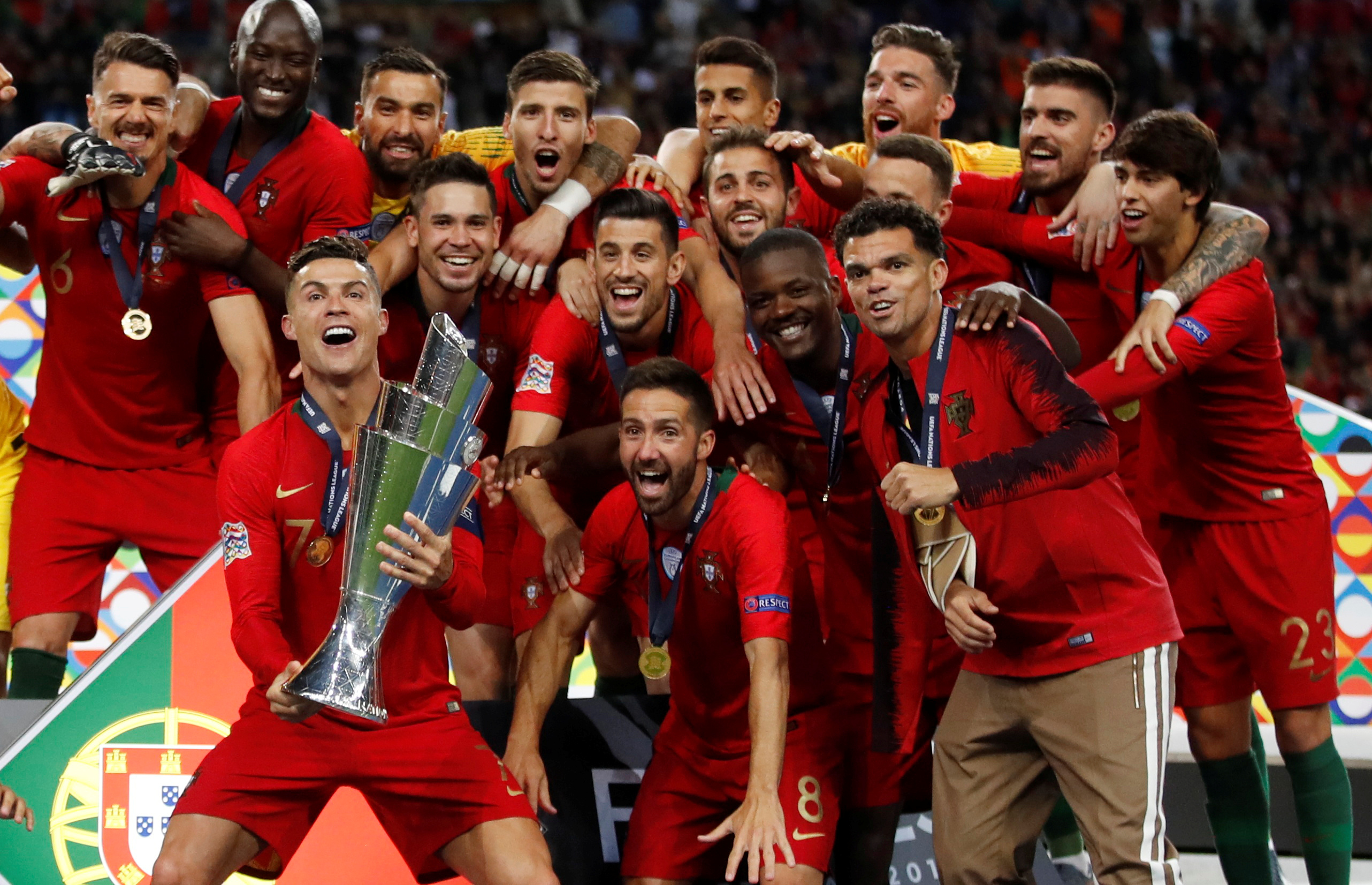 Portugal's Cristiano Ronaldo with teammates holding the 2019 Nations League trophy