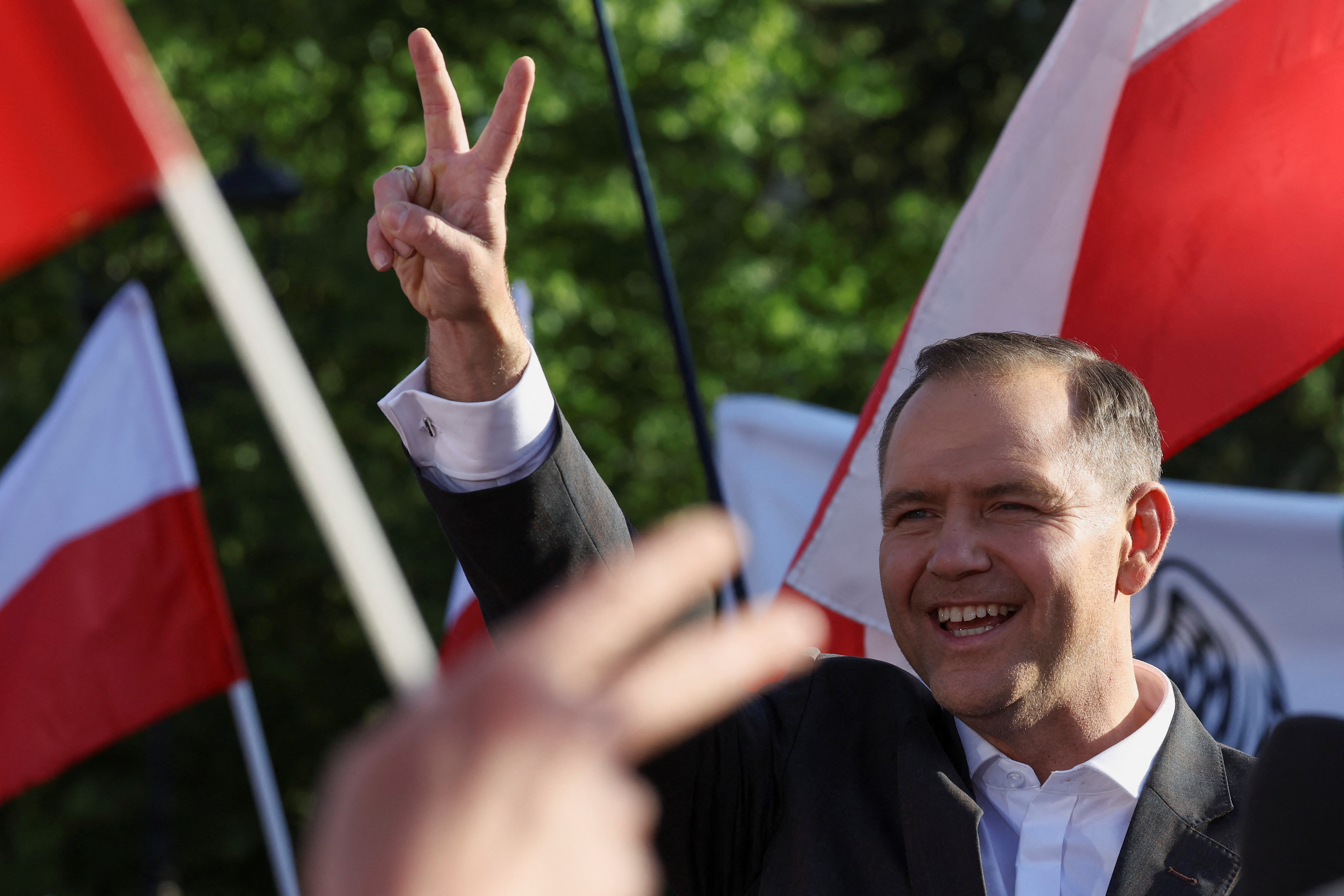 Polish presidential candidate Karol Nawrocki, backed by the main opposition Law and Justice (PiS) party, gestures during his final rally, ahead of the second round of presidential election, in Biala Podlaska, Poland, May 30, 2025. REUTERS/Kacper Pempel