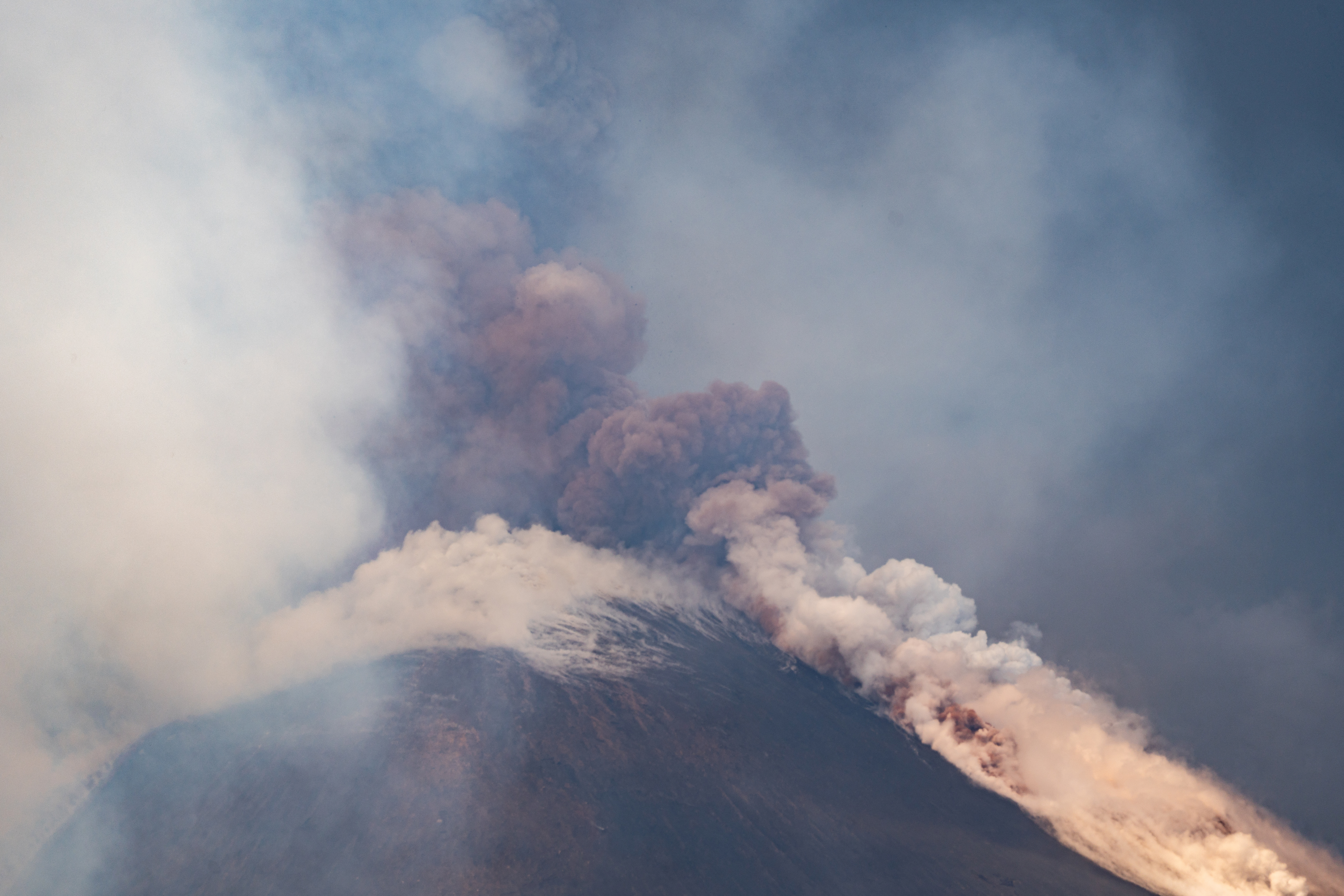A huge plume of ash, gas and rock spewed forth from Italy's Mount Etna, Europe's largest active volcano.