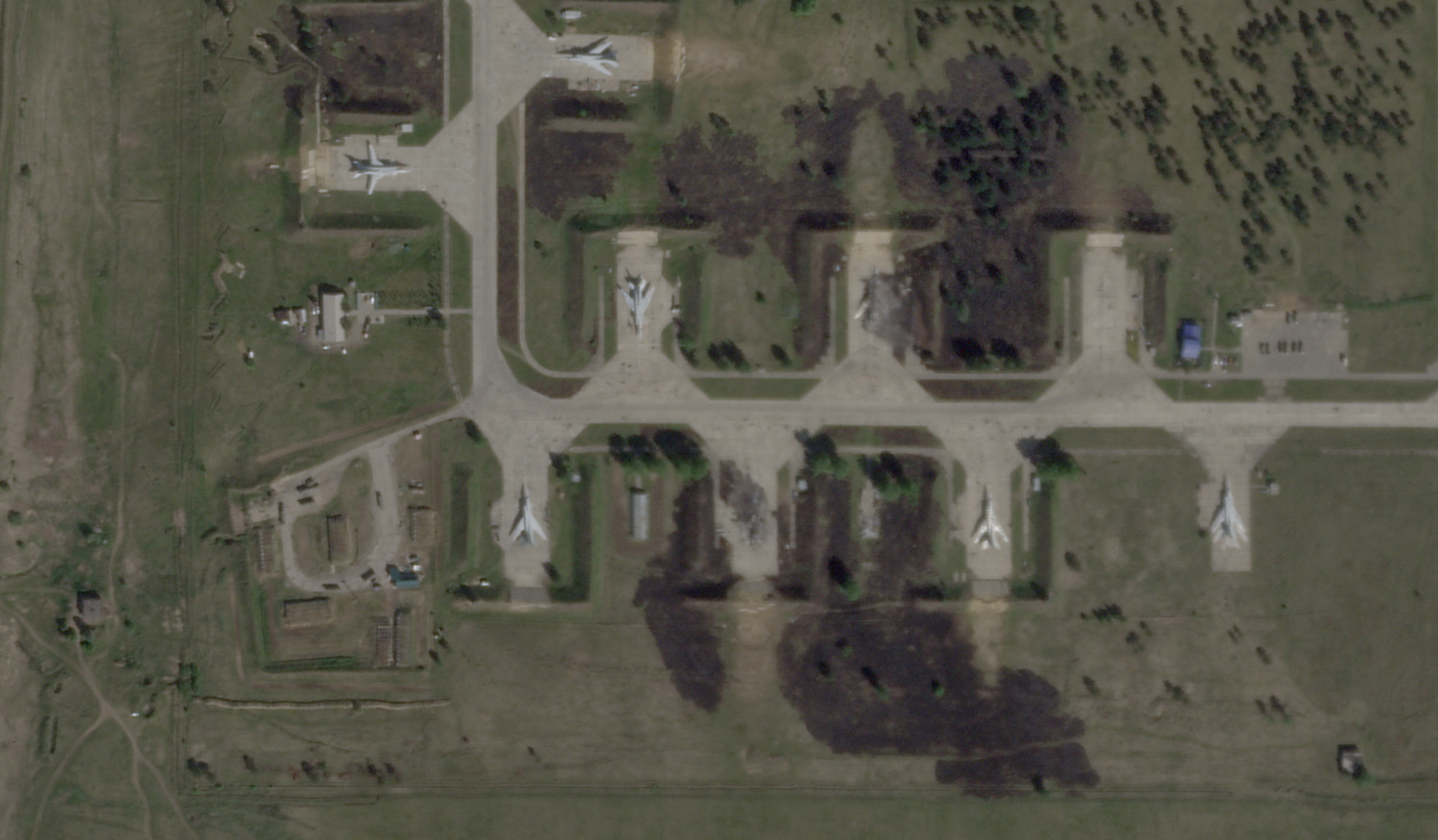 A satellite view shows military aircraft, some sitting destroyed, at the Belaya air base, near Stepnoy, Irkutsk region, Russia, June 4, 2025, after Ukraine launched a drone attack, dubbed "Operation Spider's Web", targeting Russian strategic bombers during Russia's ongoing invasion of Ukraine. 2025 Planet Labs PBC/Handout via REUTERS THIS IMAGE HAS BEEN SUPPLIED BY A THIRD PARTY. MANDATORY CREDIT