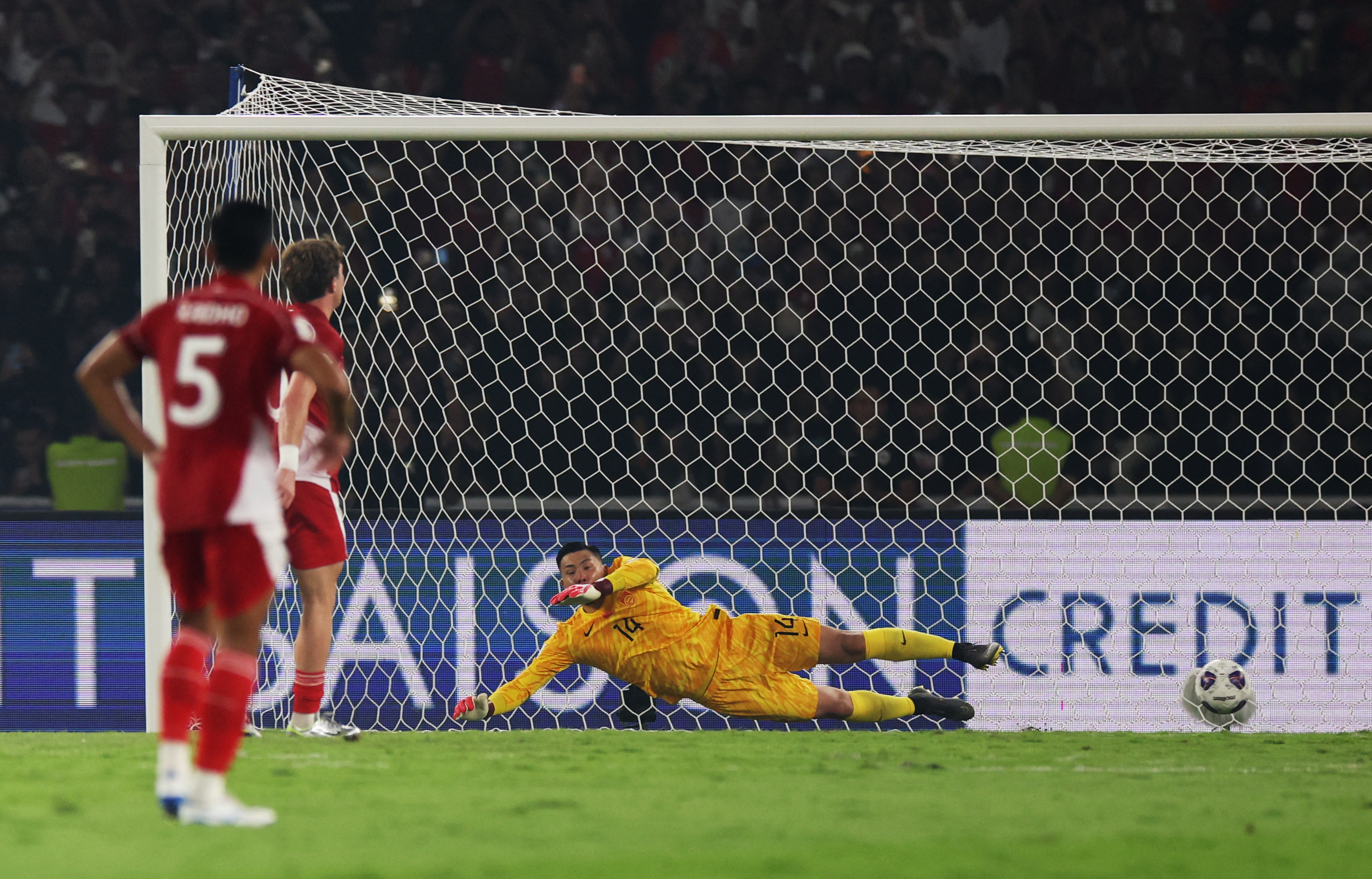 World Cup - AFC Qualifiers - Group C - Indonesia v China - Gelora Bung Karno Stadium, Jakarta, Indonesia - June 5, 2025 Indonesia's Ole Romeny scores their first goal from the penalty spot past China's Wang Dalei 