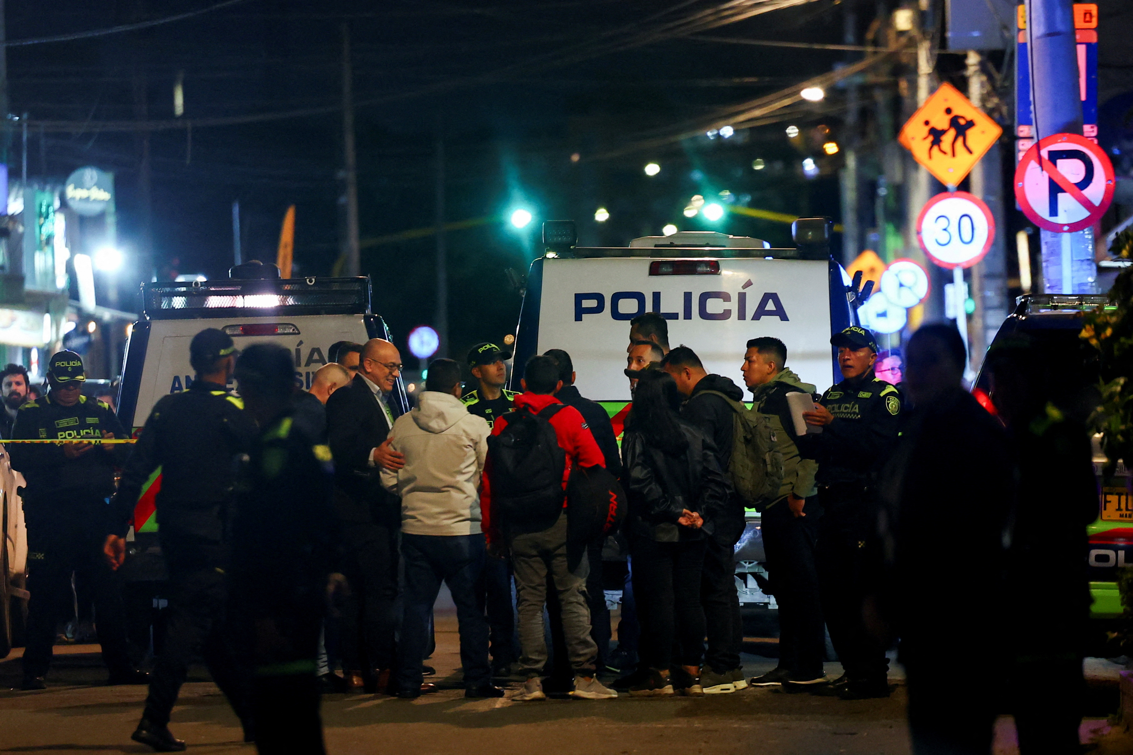 Police officers guard the area where Colombian Senator Miguel Uribe Turbay of the opposition Democratic Center party, was shot during a campaign event, in Bogota, Colombia, June 7, 2025.