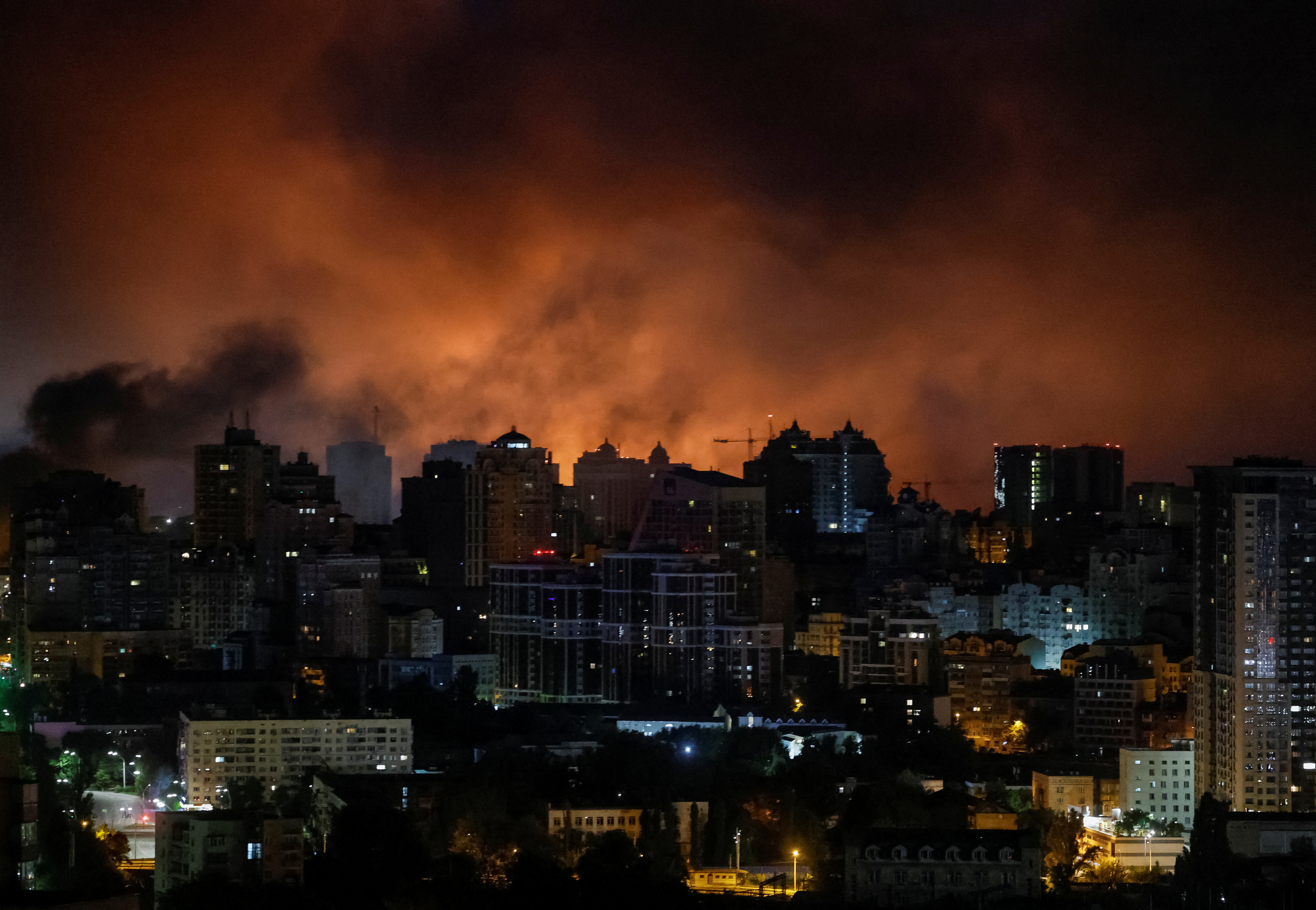 Fire and smoke are seen in the city after a Russian drone strike, amid Russia's attack on Ukraine, in Kyiv, Ukraine June 10, 2025. REUTERS/Gleb Garanich