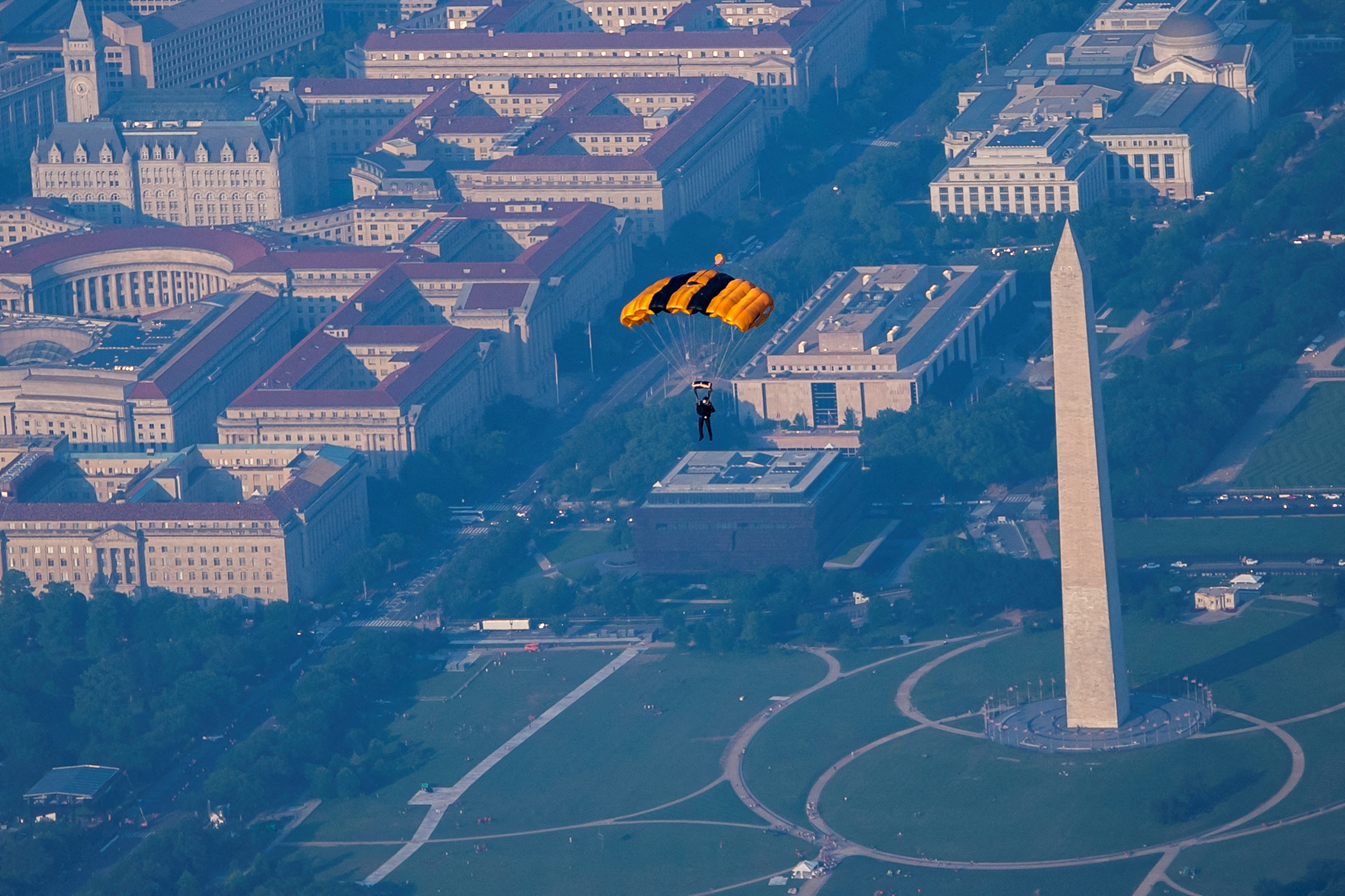 A member of the U.S. Army Golden Knights parachute team jumps during their performance for the Twilight Tattoo ceremony as part of the Army’s 250th Birthday Festival in Washington, D.C., after taking off from Joint Base Myer-Henderson Hall in Arlington, Virginia, U.S., June 11, 2025. REUTERS/Nathan Howard TPX IMAGES OF THE DAY REFILE - CLARIFYING CAPTION TO SAY THAT THE PARACHUTE TEAM TOOK OFF FROM JOINT BASE MYER-HENDERSON HALL IN ARLINGTON, VIRGINIA