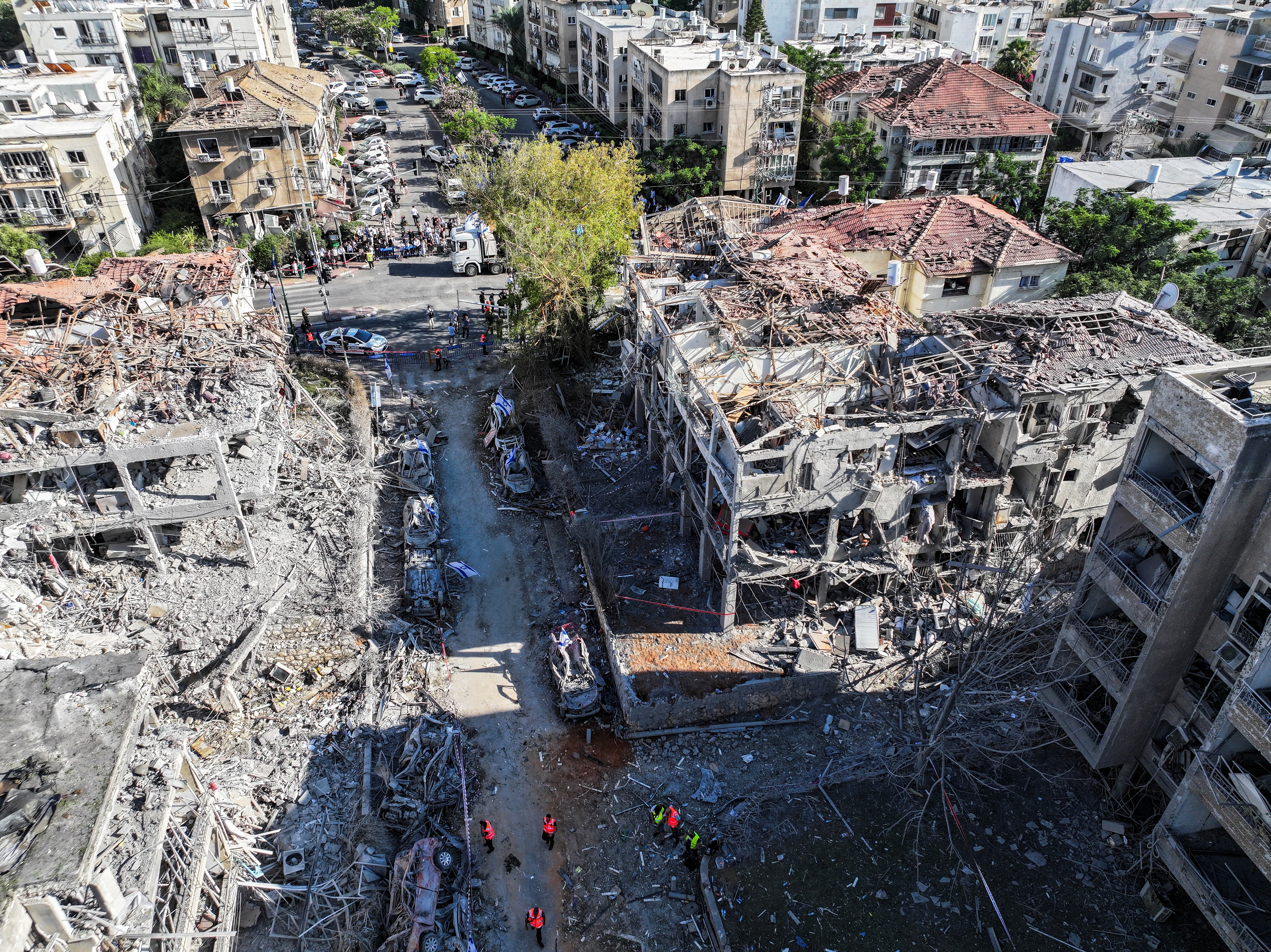 A drone photo shows the damage over residential homes at the impact site following missile attack from Iran on Israel, in Ramat Gan, Israel June 14, 2025. [Yair Palti/Reuters]