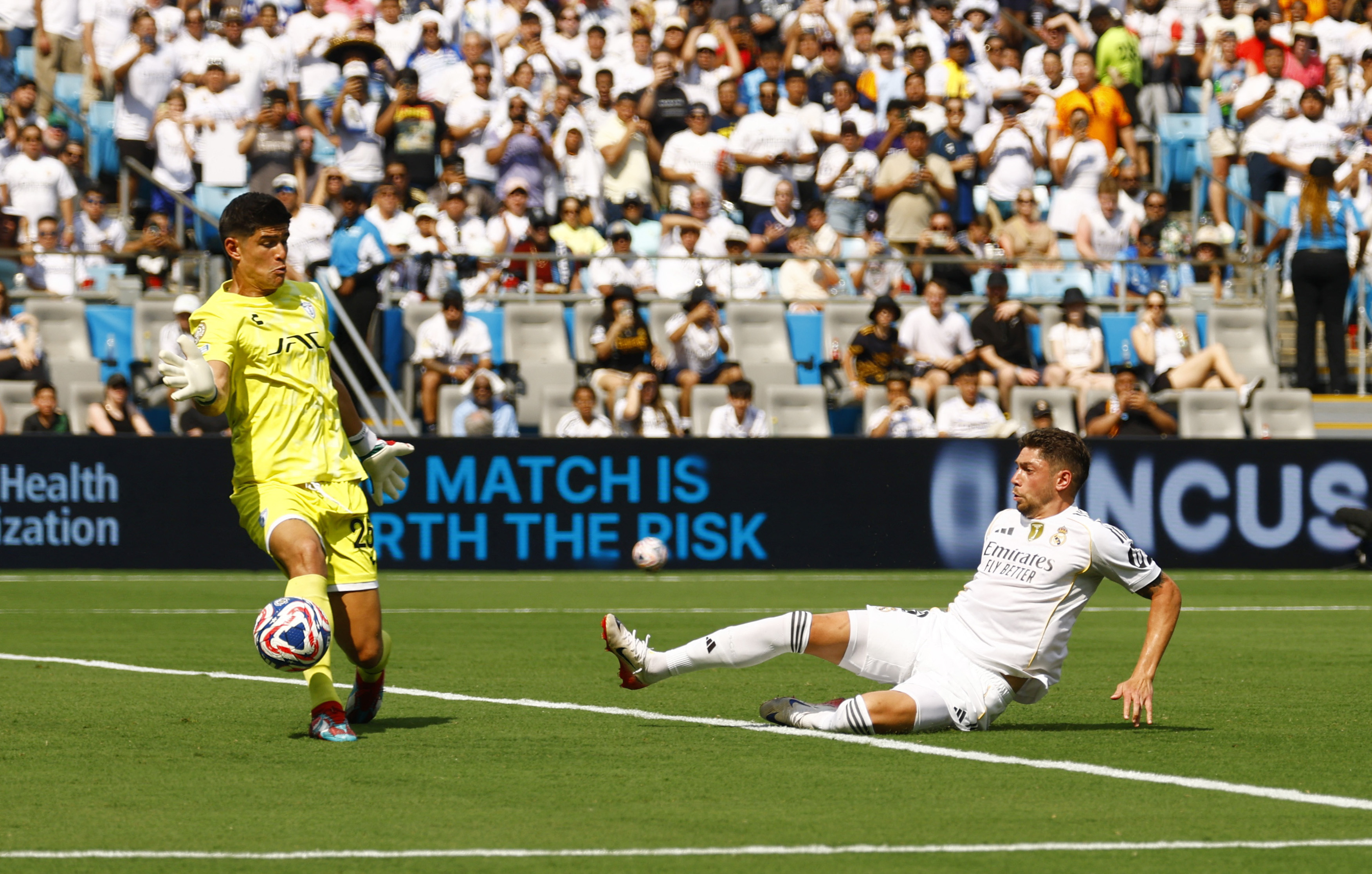 Real Madrid's Federico Valverde scores their third goal past Pachuca's Carlos Moreno