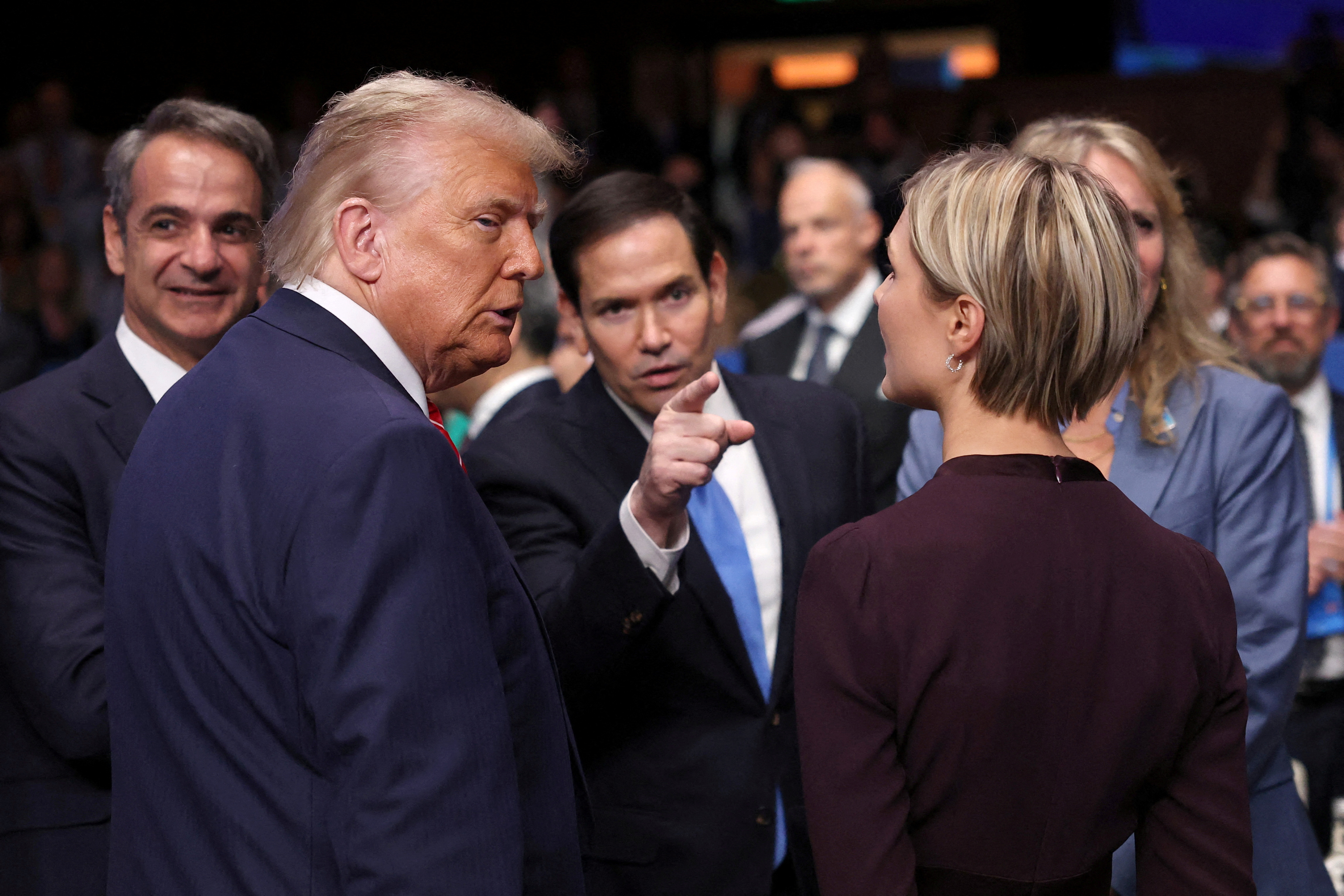 U.S. President Donald Trump, U.S. Secretary of State Marco Rubio and Greece's Prime Minister Kyriakos Mitsotakis speak with Iceland's Prime Minister Kristrun Frostadottir during a NATO summit in The Hague, Netherlands June 25, 2025. REUTERS/Toby Melville TPX IMAGES OF THE DAY