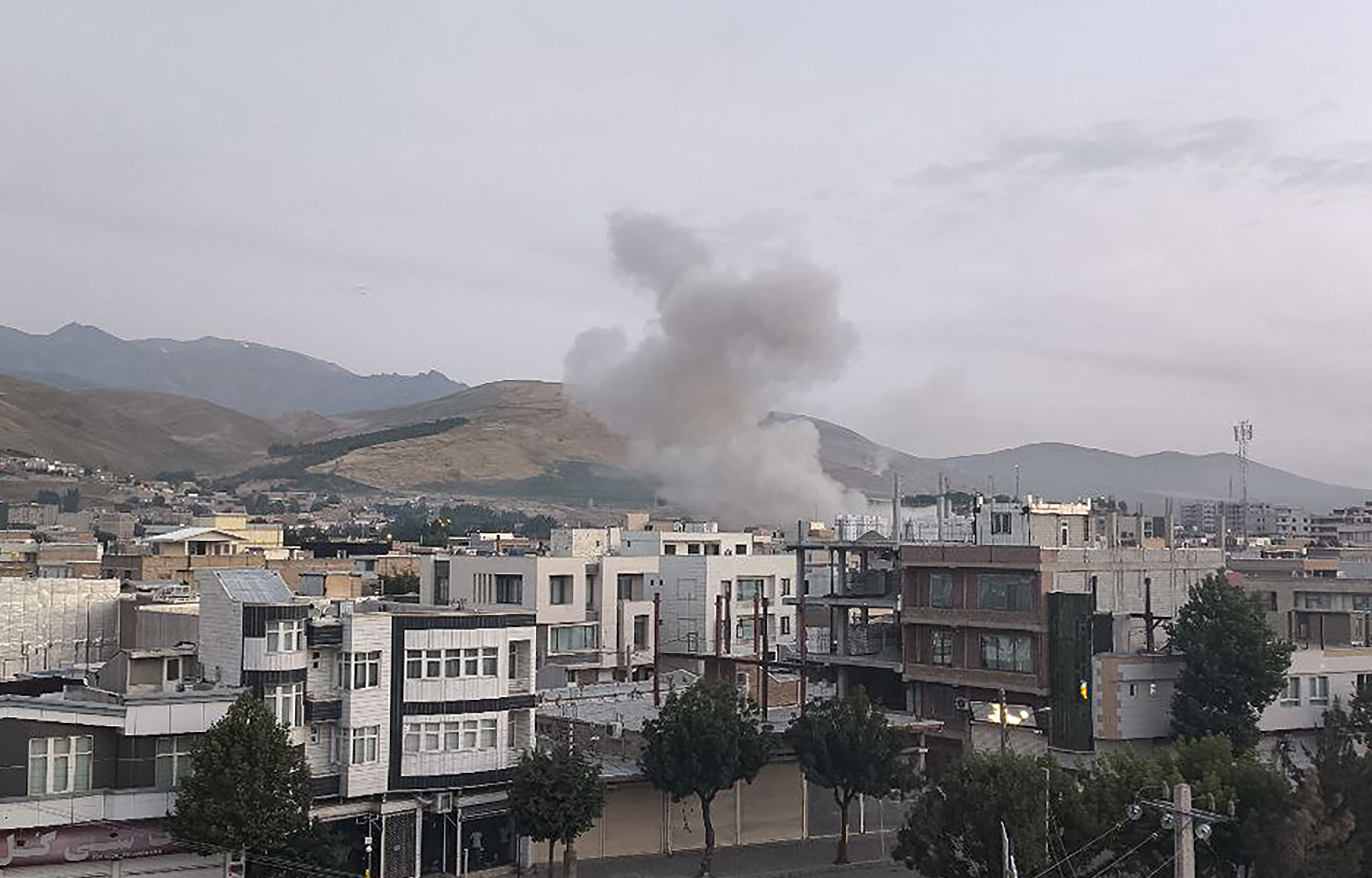 This handout photo released by Iran's Revolutionary Guard Corps (IRGC) official Sepah News Telegram channel on June 13, 2025 reportedly shows smoke billowing from a site targeted by an Israeli strike in the Iranian capital Tehran early in the morning. Israeli Prime Minister Benjamin Netanyahu said in a video statement in the early hours of June 13 that Israel carried out strikes on Iran and the military operation against the Islamic republic would "continue for as many days as it takes". (Photo by SEPAH NEWS / AFP) / RESTRICTED TO EDITORIAL USE - MANDATORY CREDIT "AFP PHOTO / SEPAH NEWS " - NO MARKETING NO ADVERTISING CAMPAIGNS - DISTRIBUTED AS A SERVICE TO CLIENTS