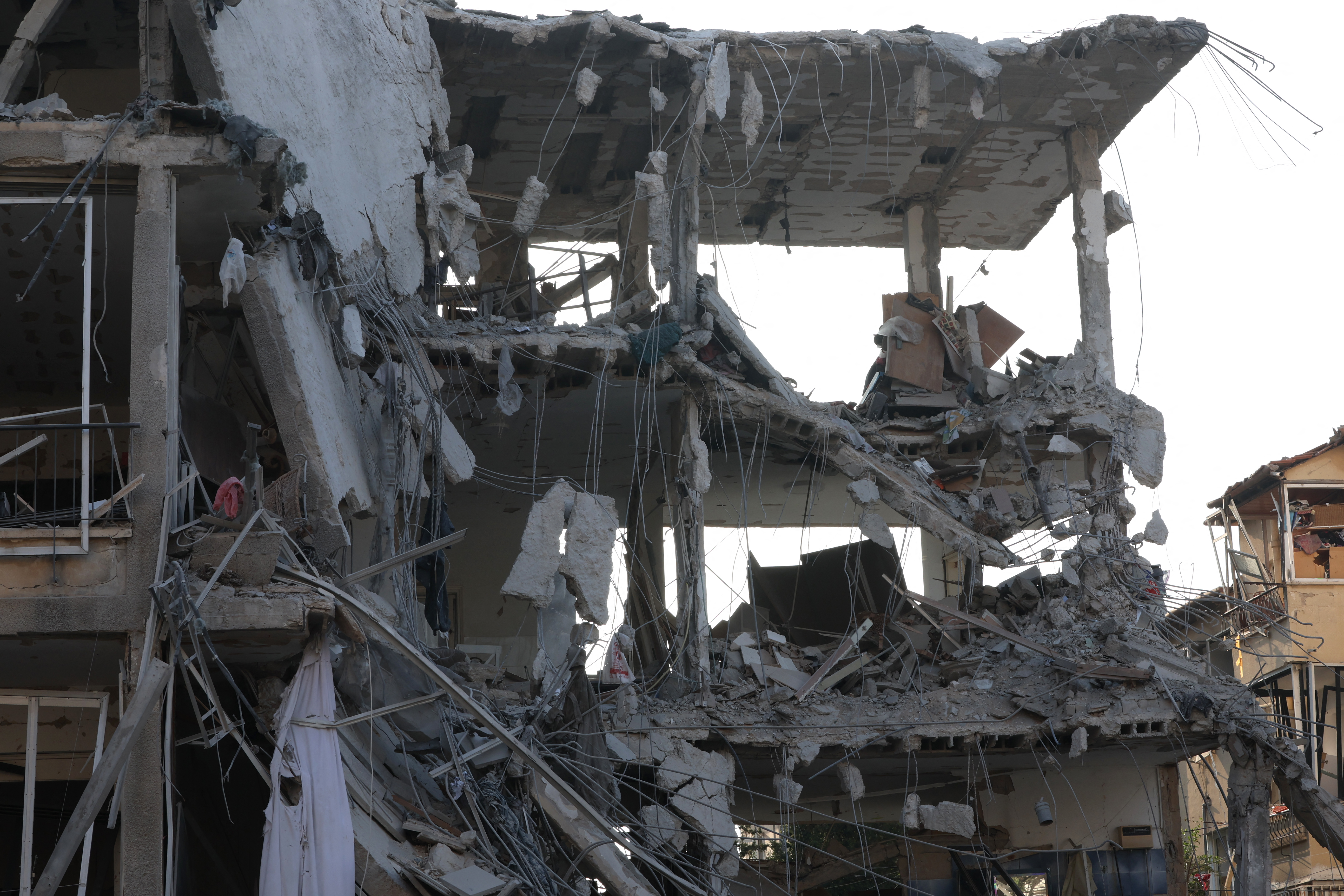 This picture shows a damaged building at a site hit by a missile fired from Iran in the Israeli city of Ramat Gan