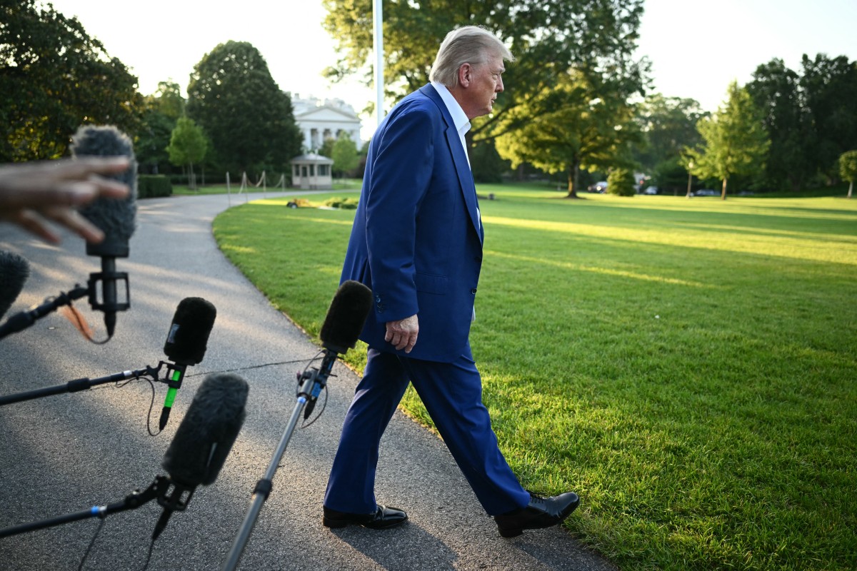 US President Donald Trump walks to board Marine One before departing from the South Lawn of the White House.